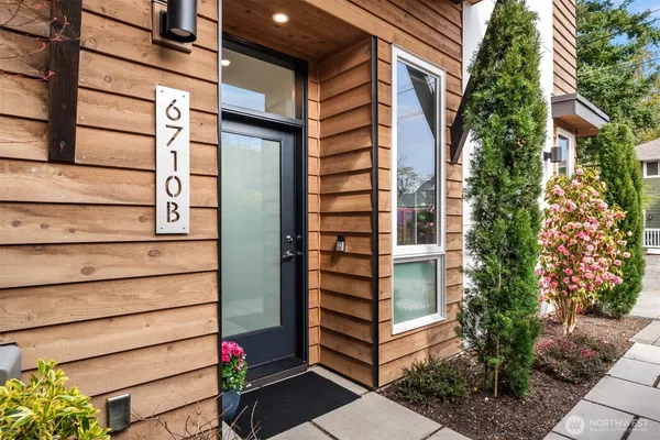 a view of front door and tree