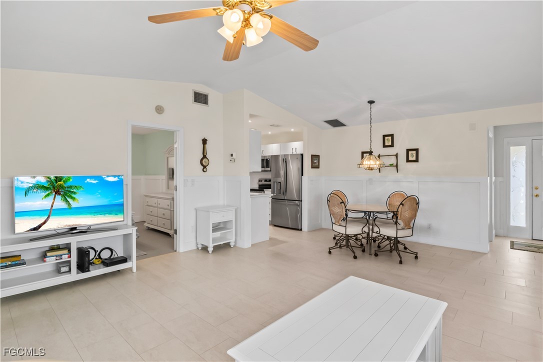 2781 Bruce Street Matlacha, FL 33993 - Photo 11 of 39 a living room with furniture and a flat screen tv