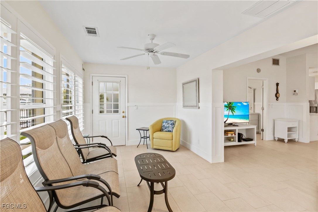 2781 Bruce Street Matlacha, FL 33993 - Photo 17 of 39 a living room with furniture and a flat screen tv