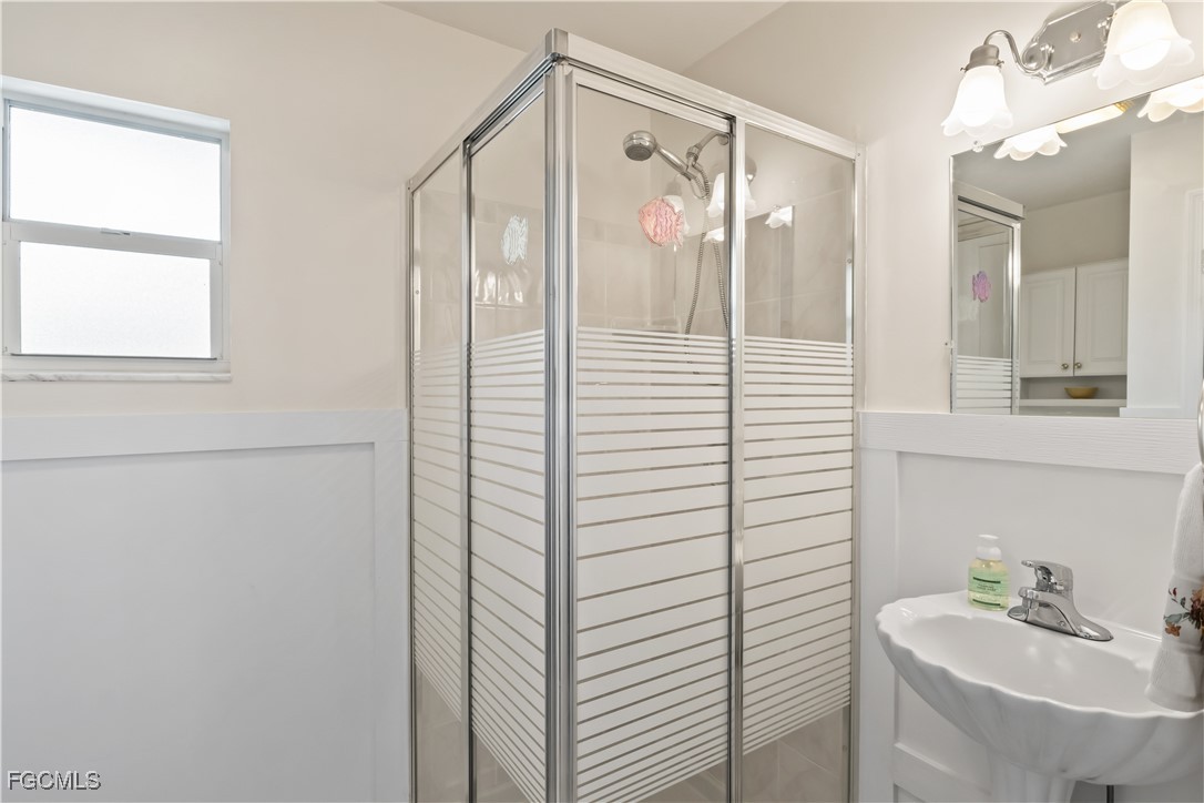 2781 Bruce Street Matlacha, FL 33993 - Photo 21 of 39 a bathroom with a shower and a sink