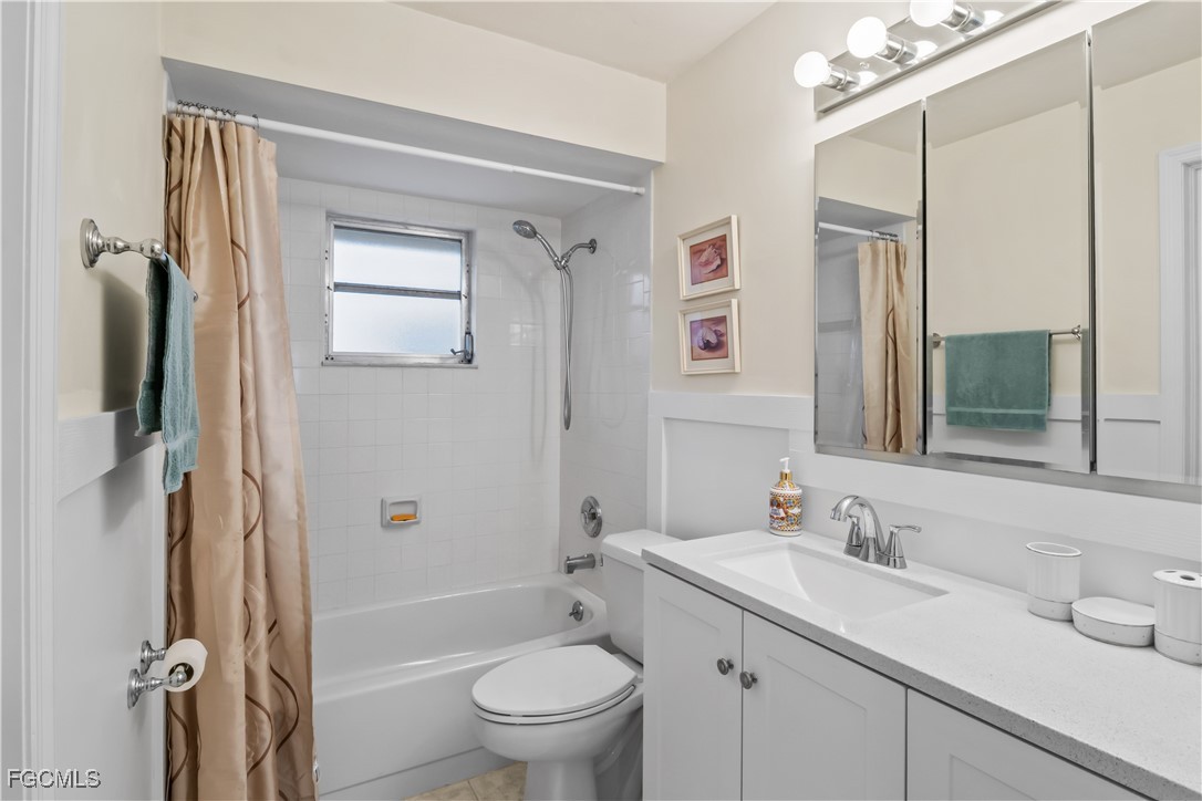 2781 Bruce Street Matlacha, FL 33993 - Photo 24 of 39 a bathroom with a sink toilet and shower