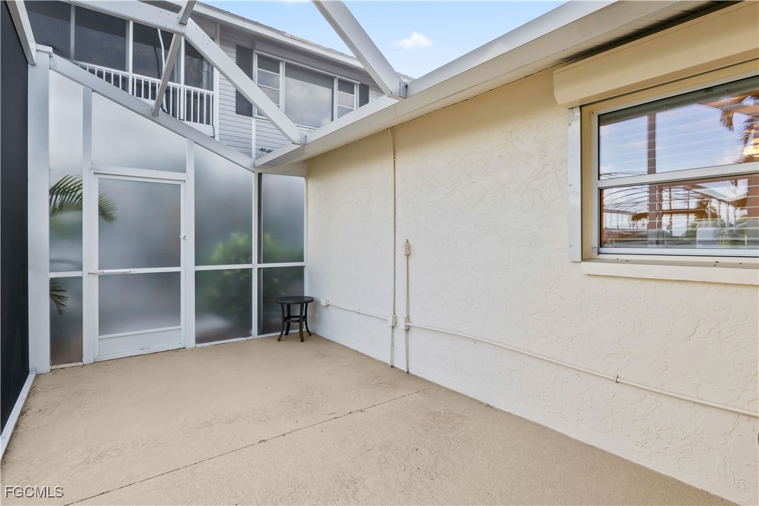 2781 Bruce Street Matlacha, FL 33993 - Photo 26 of 39 a view of an empty room with a window