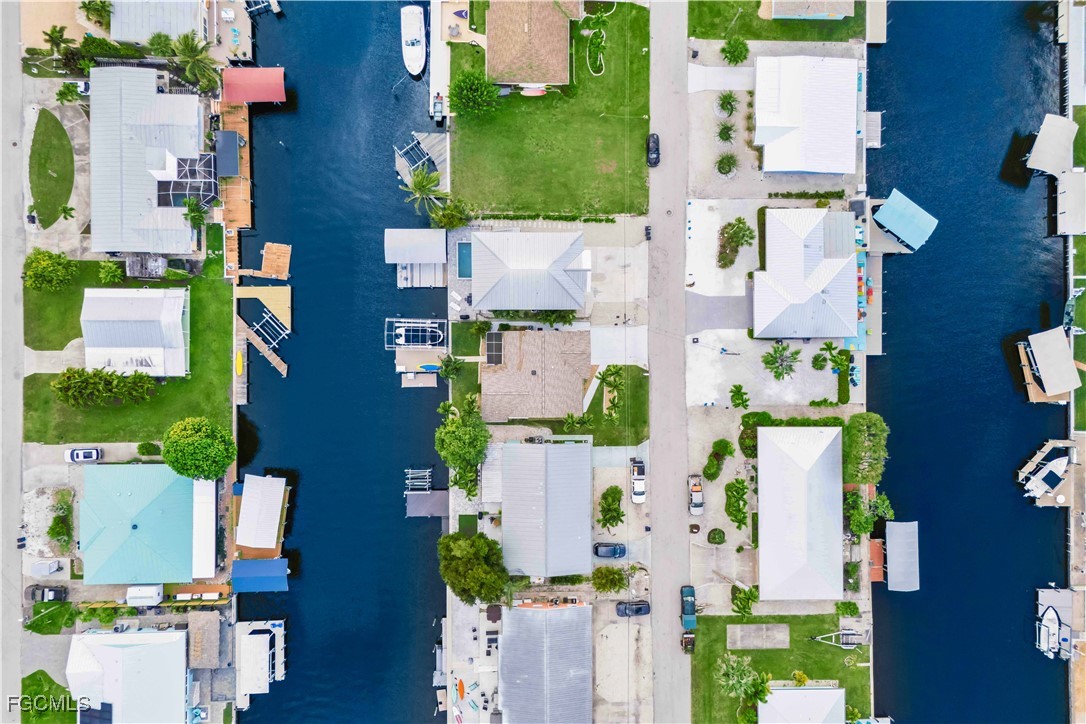 2781 Bruce Street Matlacha, FL 33993 - Photo 33 of 39 an aerial view of residential houses with outdoor space and street view