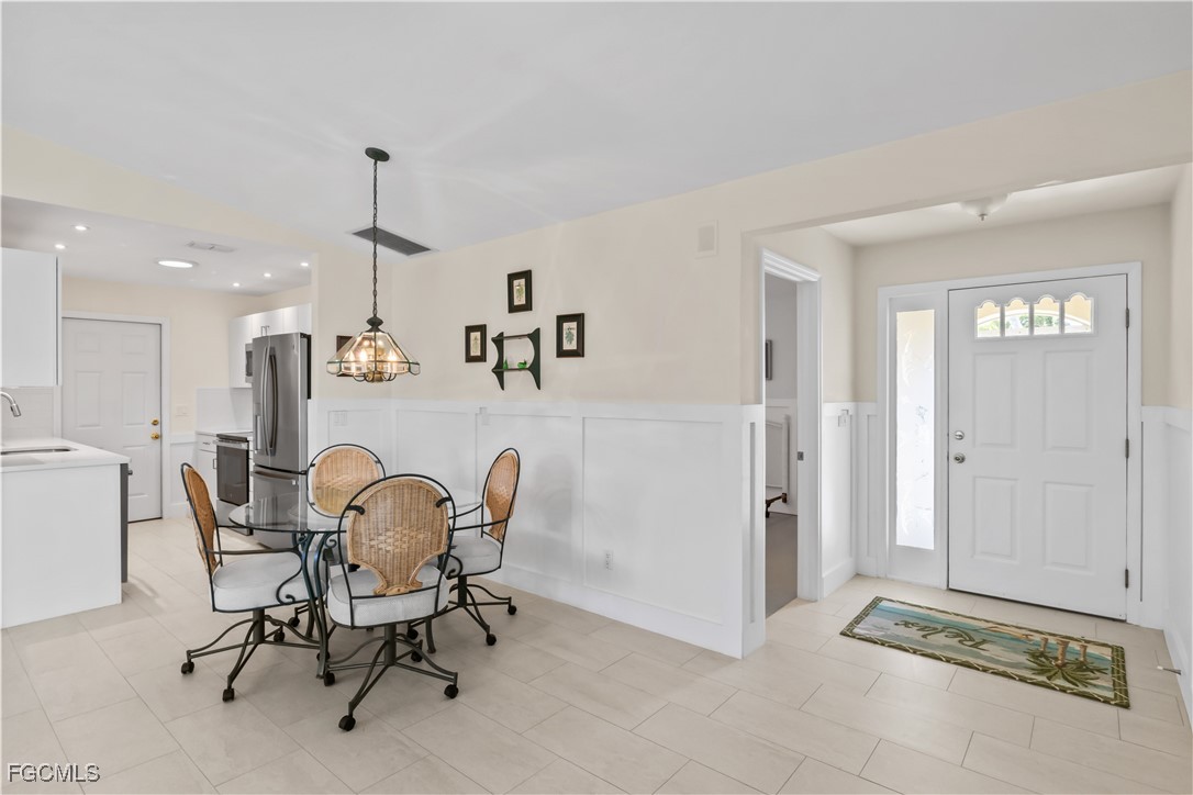 2781 Bruce Street Matlacha, FL 33993 - Photo 10 of 39 a view of a dining room with furniture