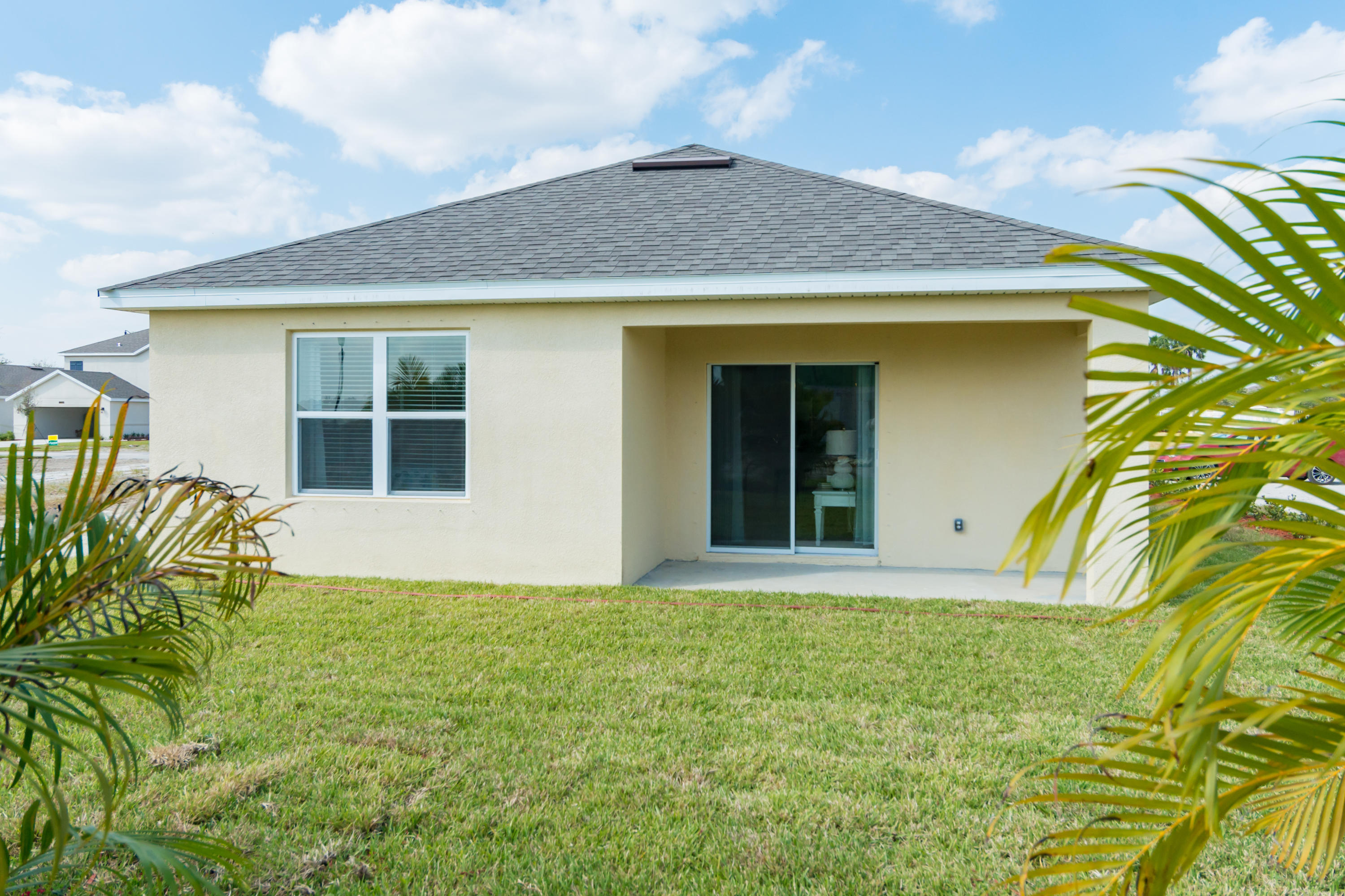 12152 Rimini Way Port St. Lucie, FL 34987 - Photo 18 of 26 rear exterior