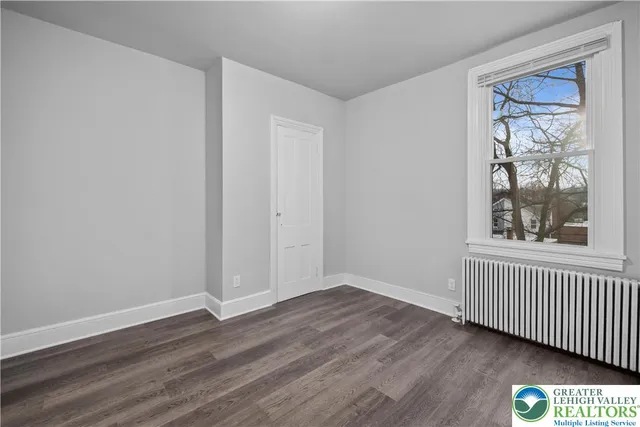 a picture of a wall with a white wall and a painting