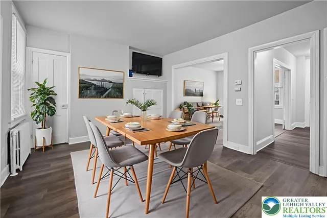 a kitchen with granite countertop stainless steel appliances and wooden cabinets