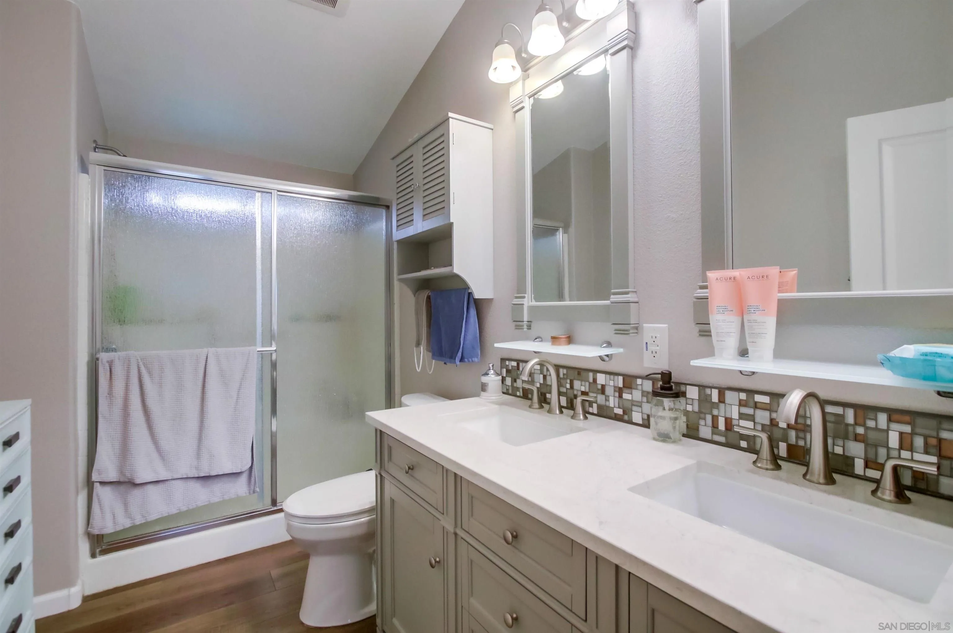 15935 Spring Oaks Road, Unit SPACE 16 El Cajon, CA 92021 - Photo 18 of 45 a bathroom with a sink a toilet and shower