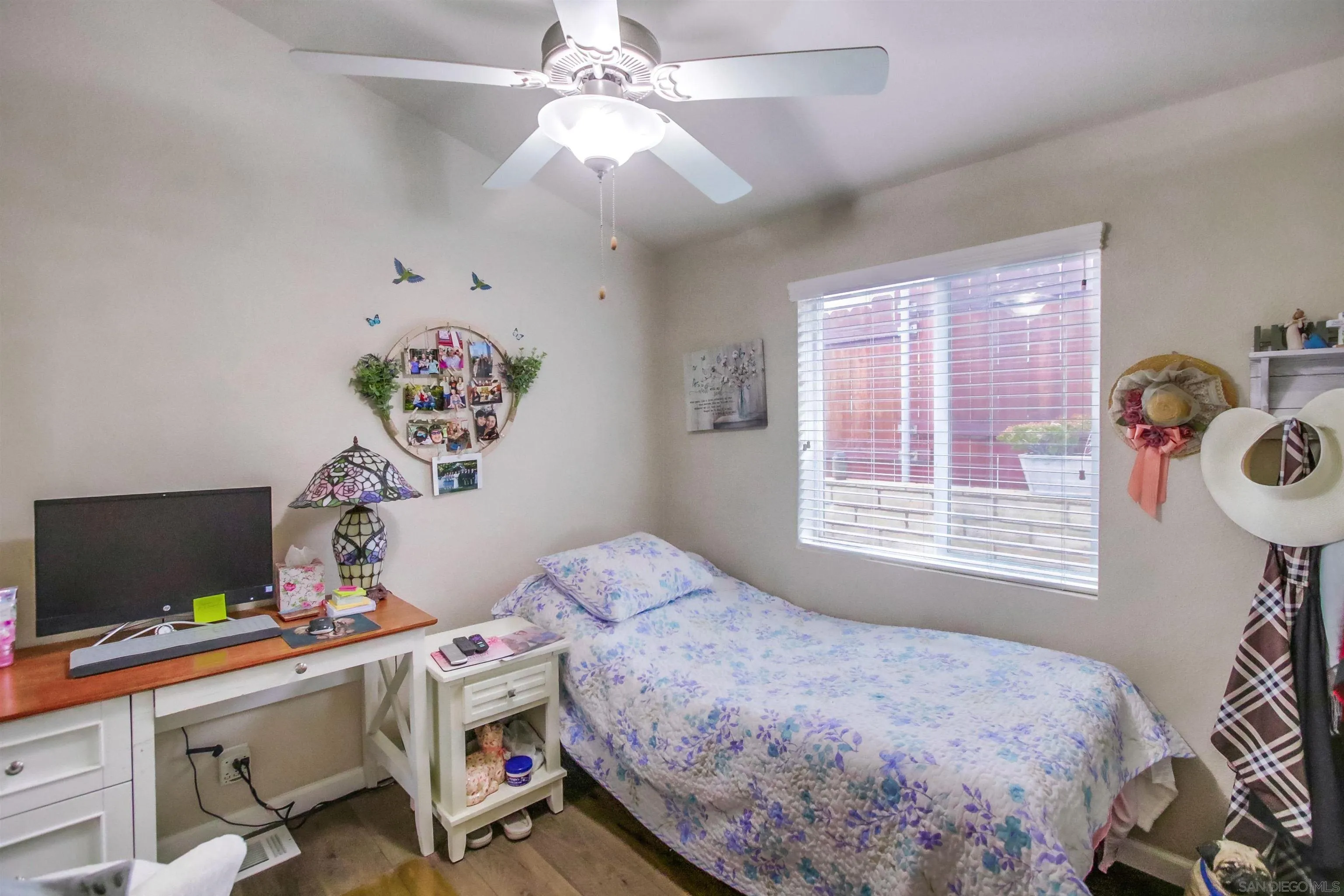 15935 Spring Oaks Road, Unit SPACE 16 El Cajon, CA 92021 - Photo 19 of 45 a bedroom with a bed and a window