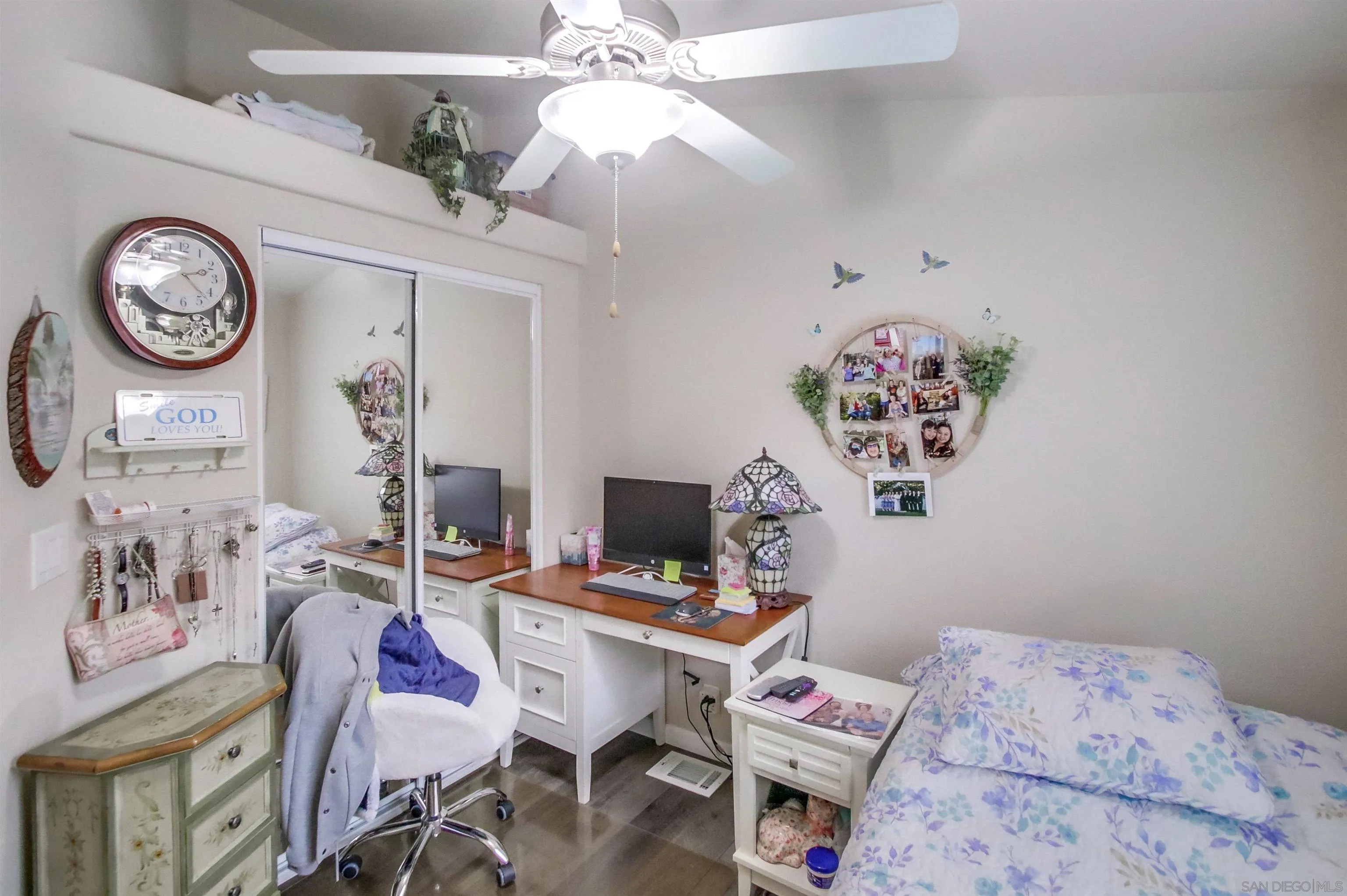 15935 Spring Oaks Road, Unit SPACE 16 El Cajon, CA 92021 - Photo 21 of 45 a view of a workspace with furniture and a ceiling fan