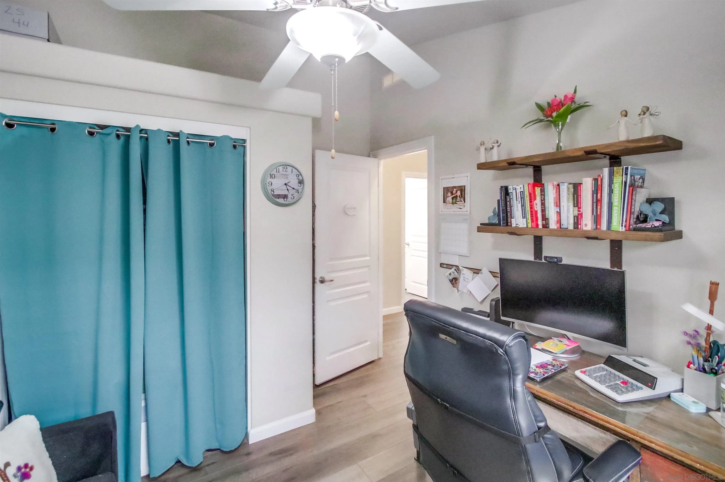 15935 Spring Oaks Road, Unit SPACE 16 El Cajon, CA 92021 - Photo 22 of 45 a living room with furniture and a flat screen tv