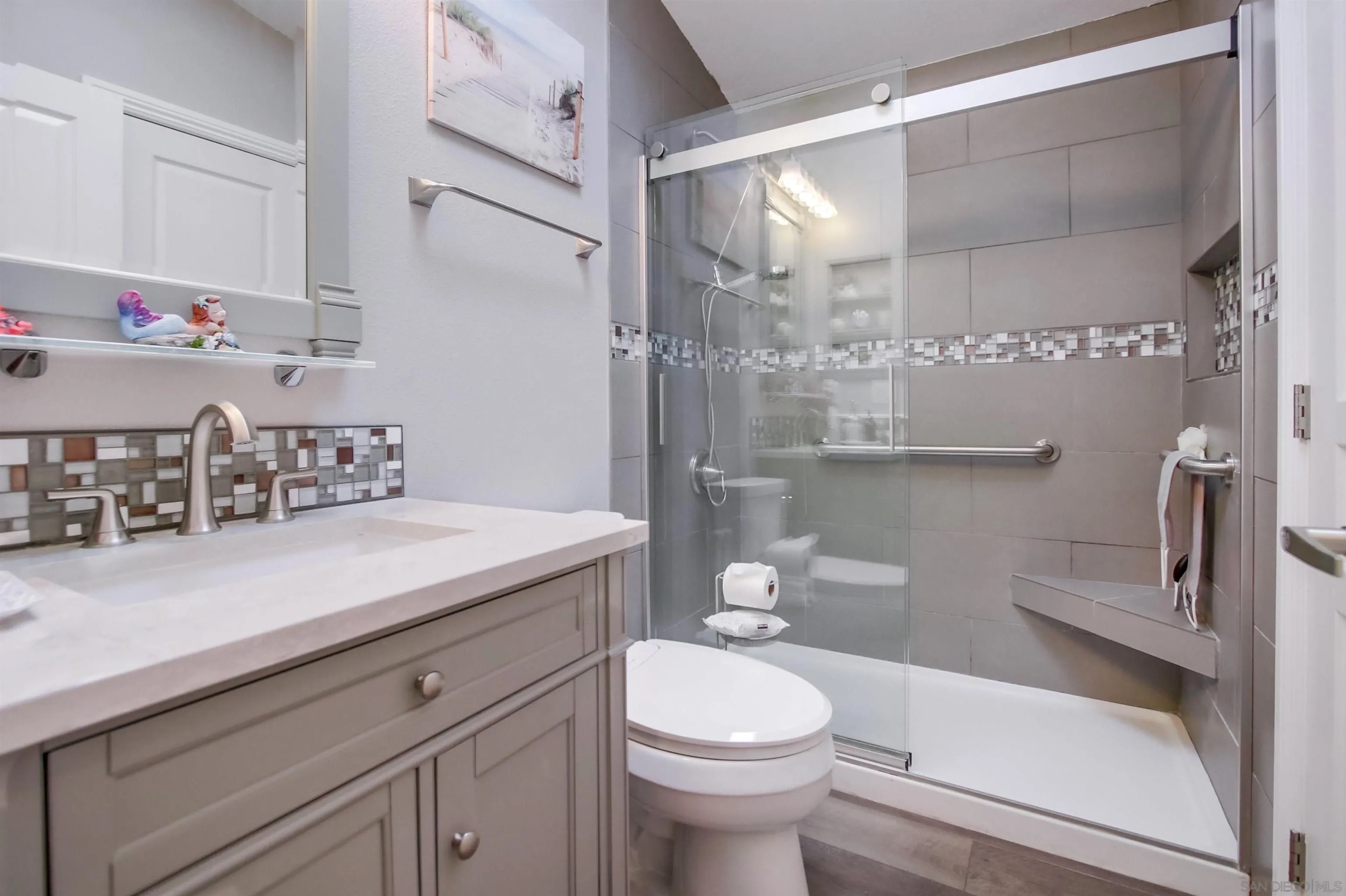 15935 Spring Oaks Road, Unit SPACE 16 El Cajon, CA 92021 - Photo 23 of 45 a bathroom with a granite countertop sink a toilet and shower