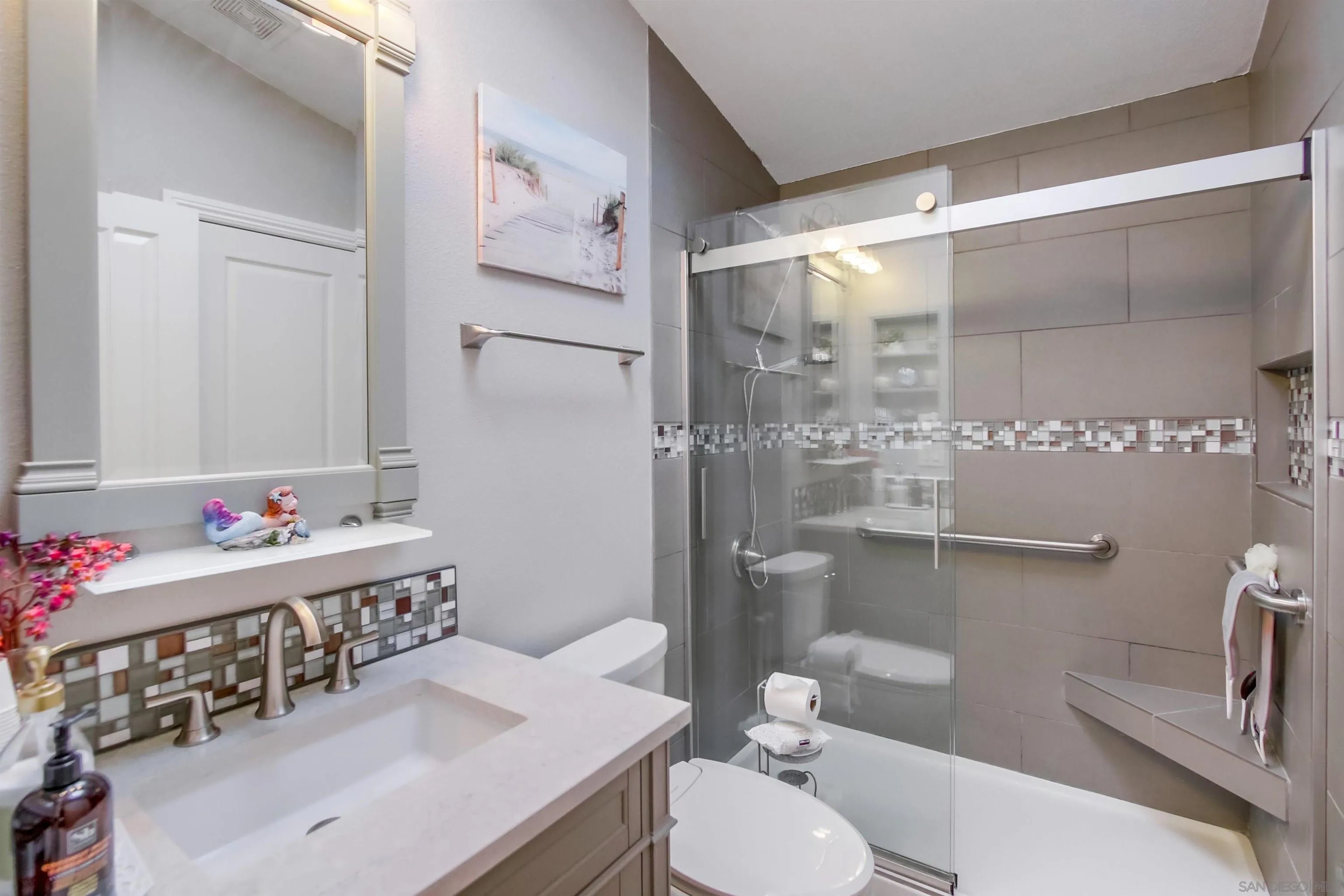 15935 Spring Oaks Road, Unit SPACE 16 El Cajon, CA 92021 - Photo 24 of 45 a bathroom with a sink vanity mirror and toilet