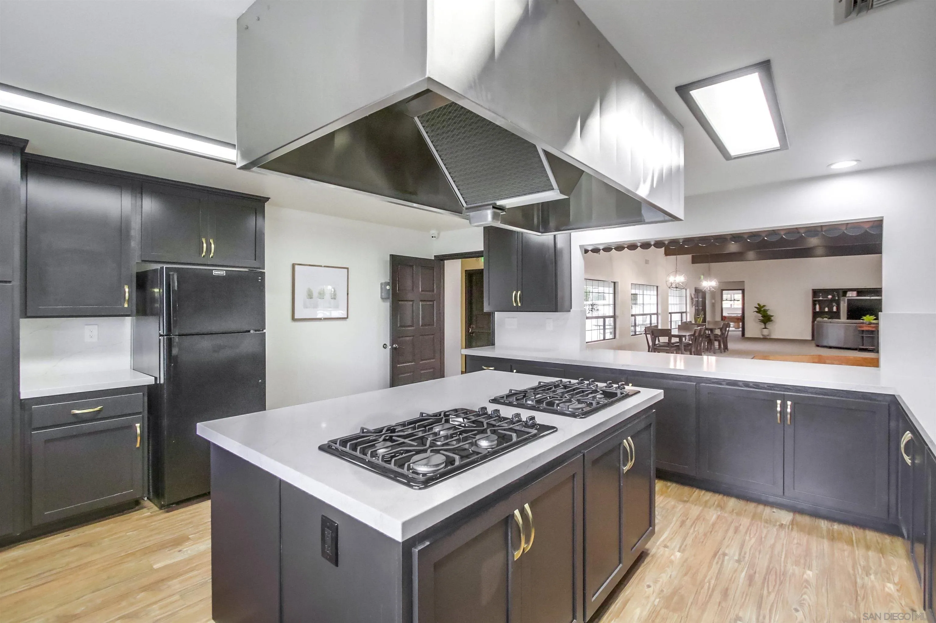 15935 Spring Oaks Road, Unit SPACE 16 El Cajon, CA 92021 - Photo 39 of 45 a kitchen with stainless steel appliances granite countertop a sink stove and refrigerator
