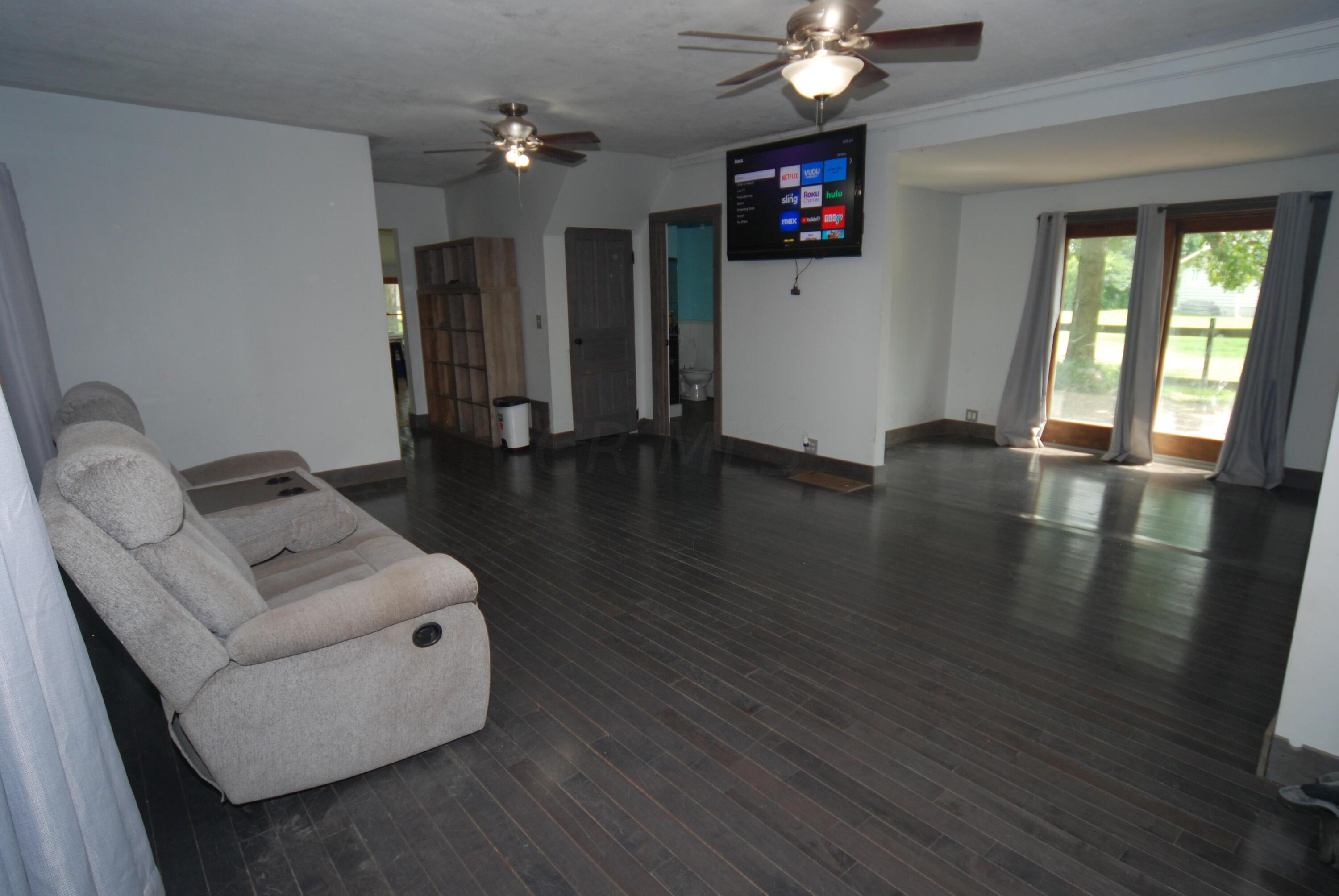 4858 Hedley Road Radnor, OH 43066 - Photo 4 of 24 living room toward den