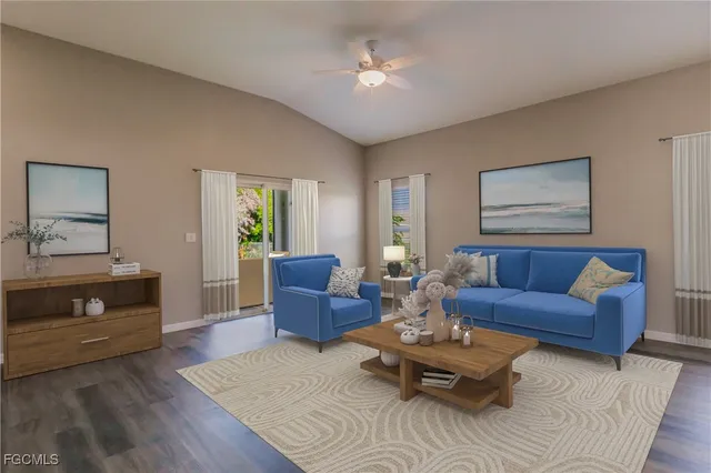 a living room with furniture rug and window