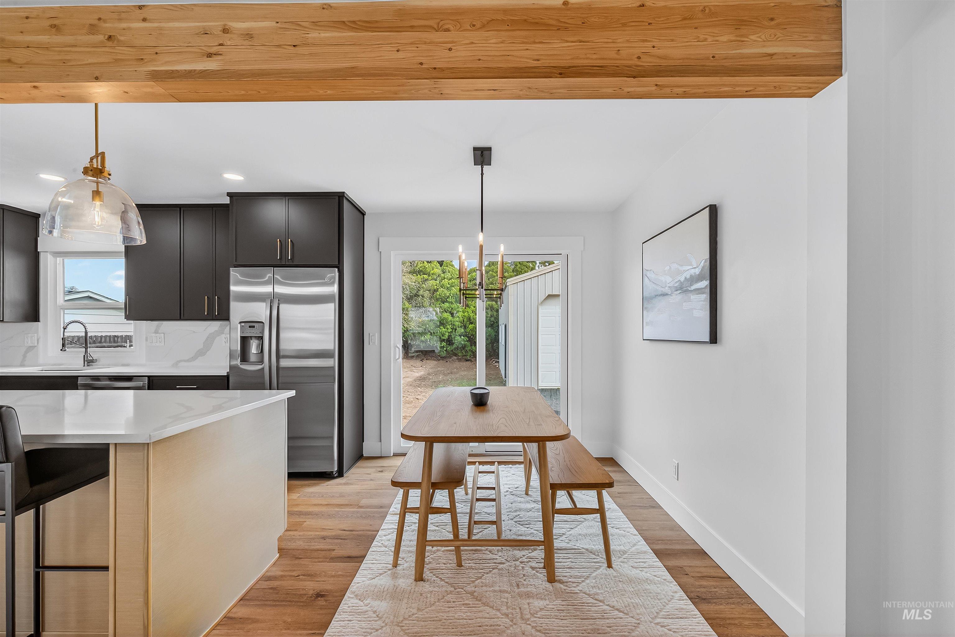 3513 8th Street Lewiston, ID 83501 - Photo 16 of 43 Dining space with light wood-type flooring and hanging lights