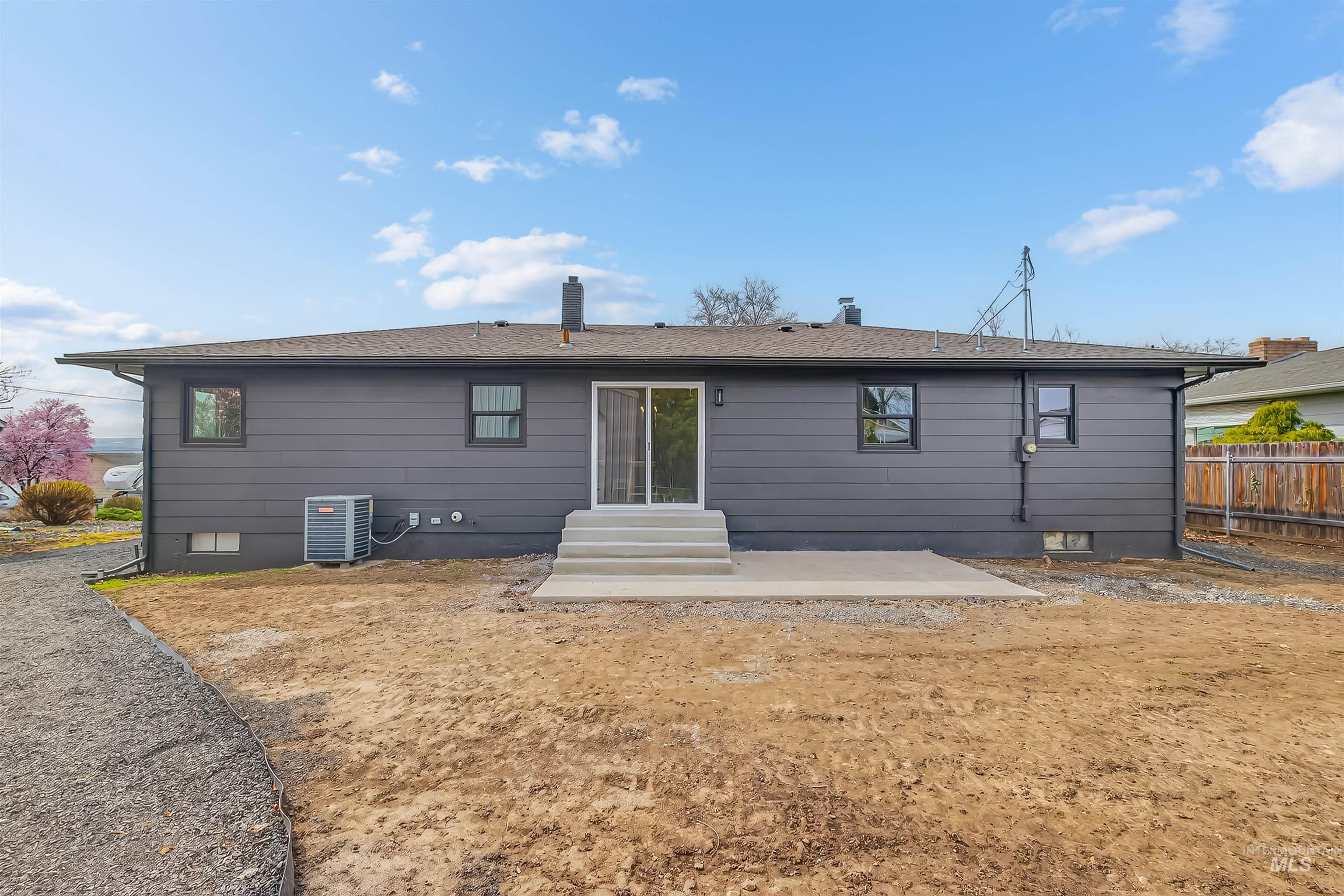 3513 8th Street Lewiston, ID 83501 - Photo 41 of 43 Back of house with a patio, entry steps, and roof with shingles