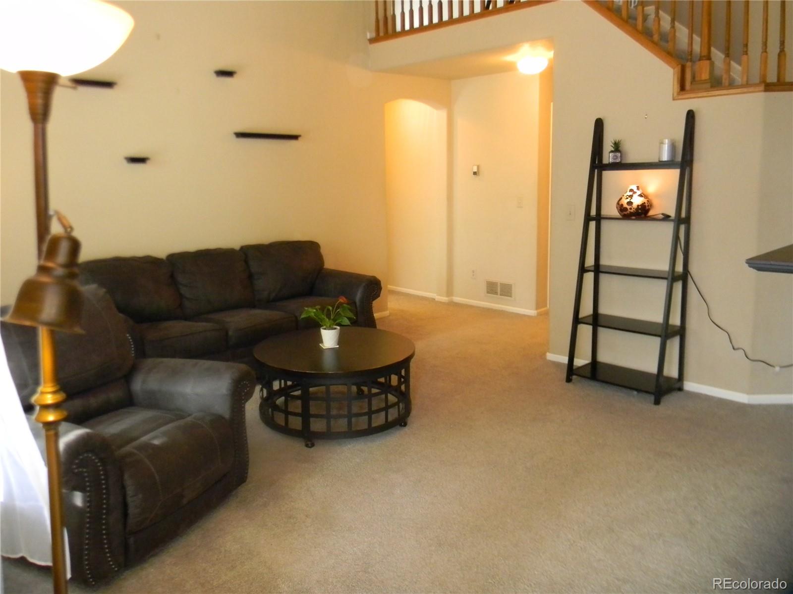 4092 Starflower Road Castle Rock, CO 80109 - Photo 10 of 28 a living room with furniture