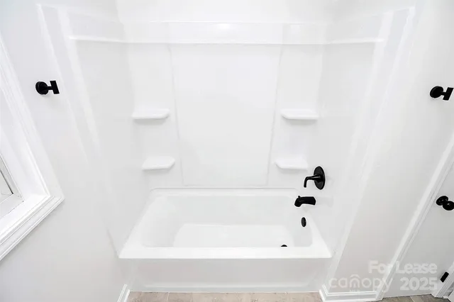 a bathroom with a bathtub