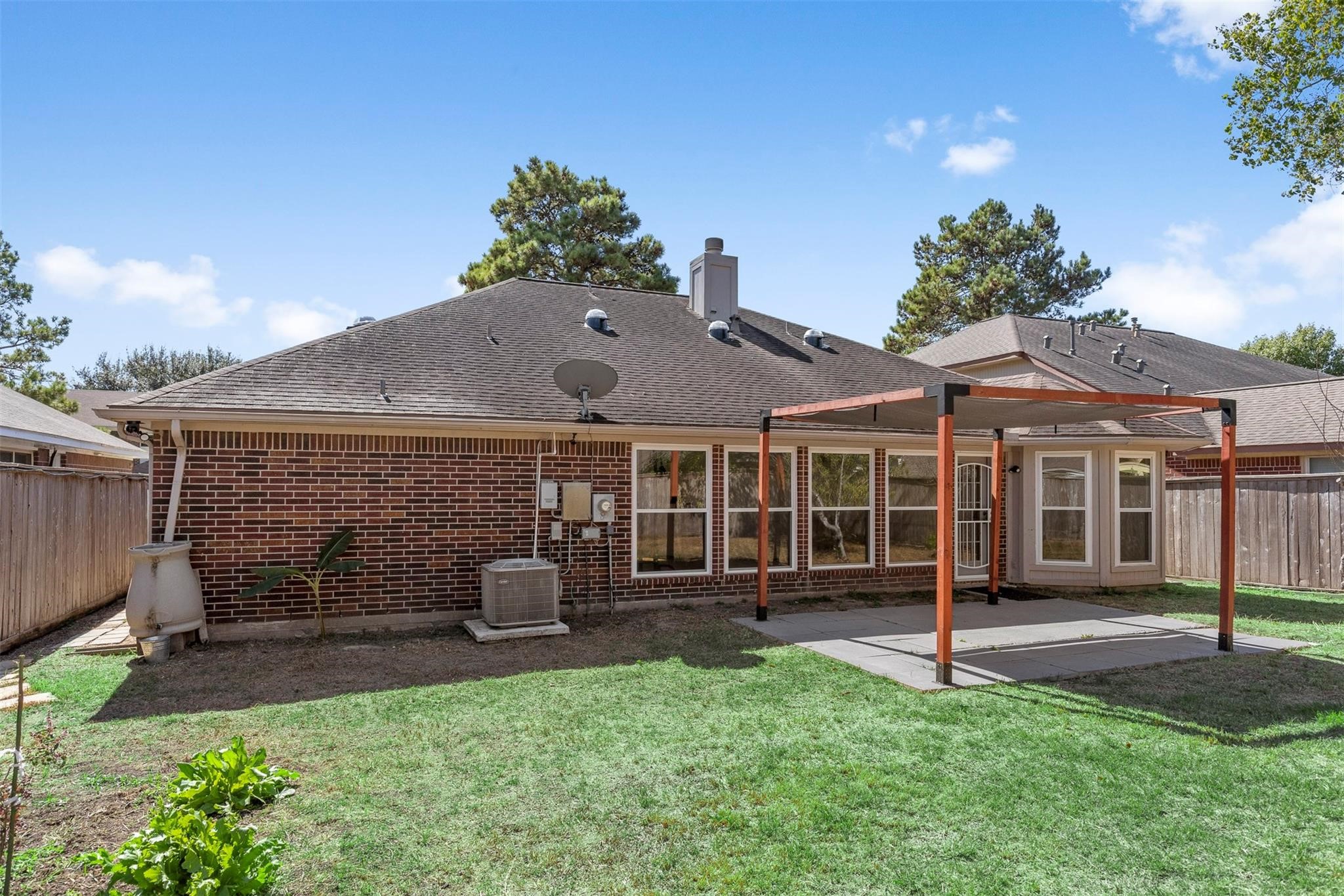 3406 Meadowlark Lane Spring, TX 77388 - Photo 19 of 19 a front view of a house with a garden