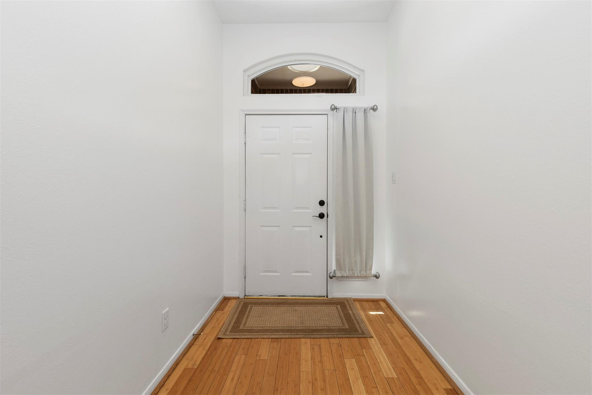3406 Meadowlark Lane Spring, TX 77388 - Photo 4 of 19 a view of a room with wooden floor and brick walls