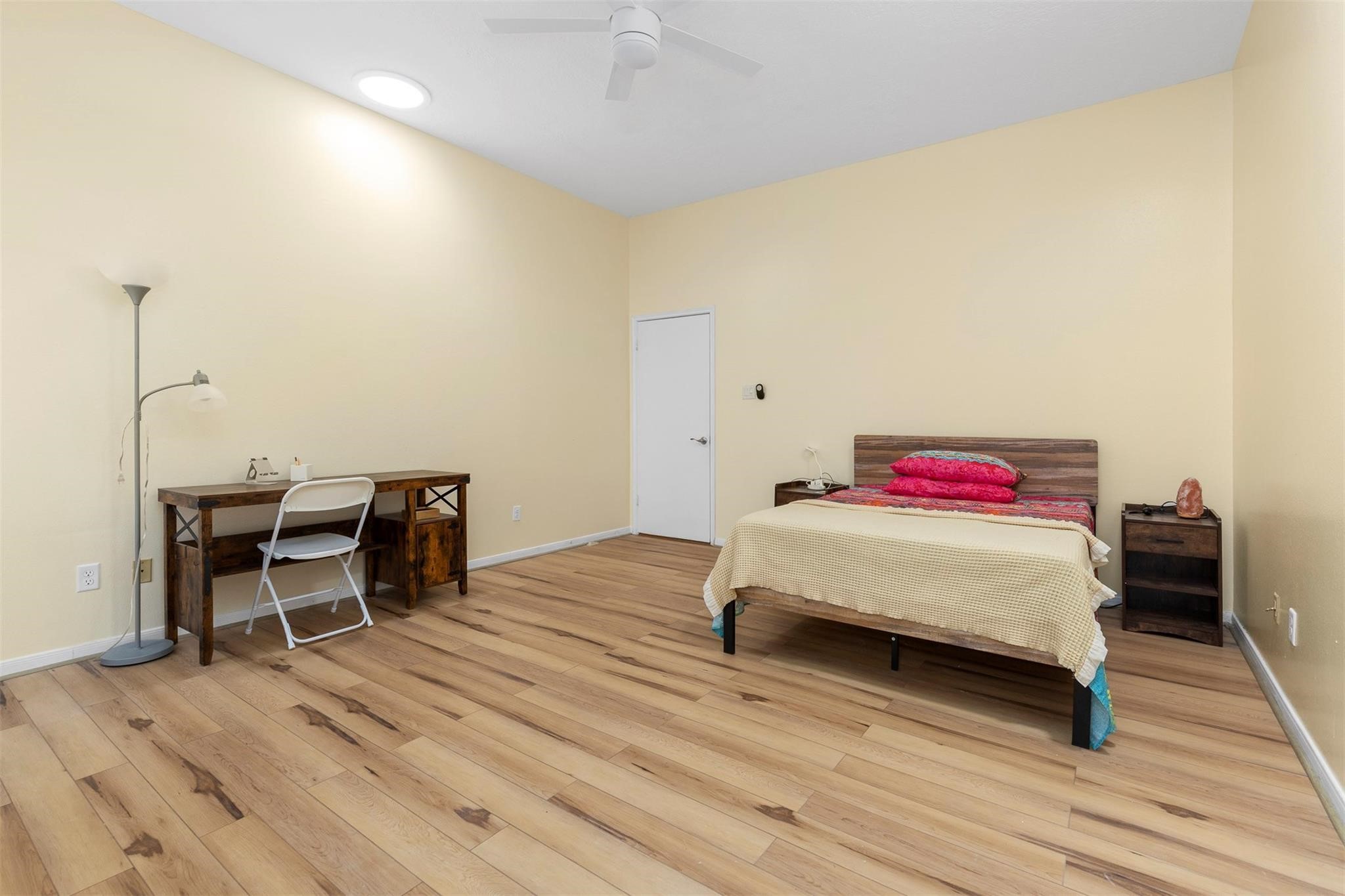 3406 Meadowlark Lane Spring, TX 77388 - Photo 5 of 19 a bedroom with a bed and a desk