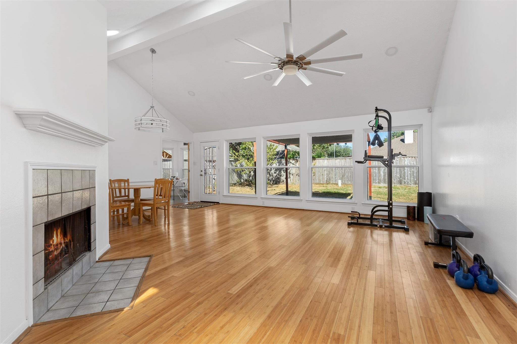 3406 Meadowlark Lane Spring, TX 77388 - Photo 9 of 19 a view of a livingroom with furniture a fireplace wooden floor and a window