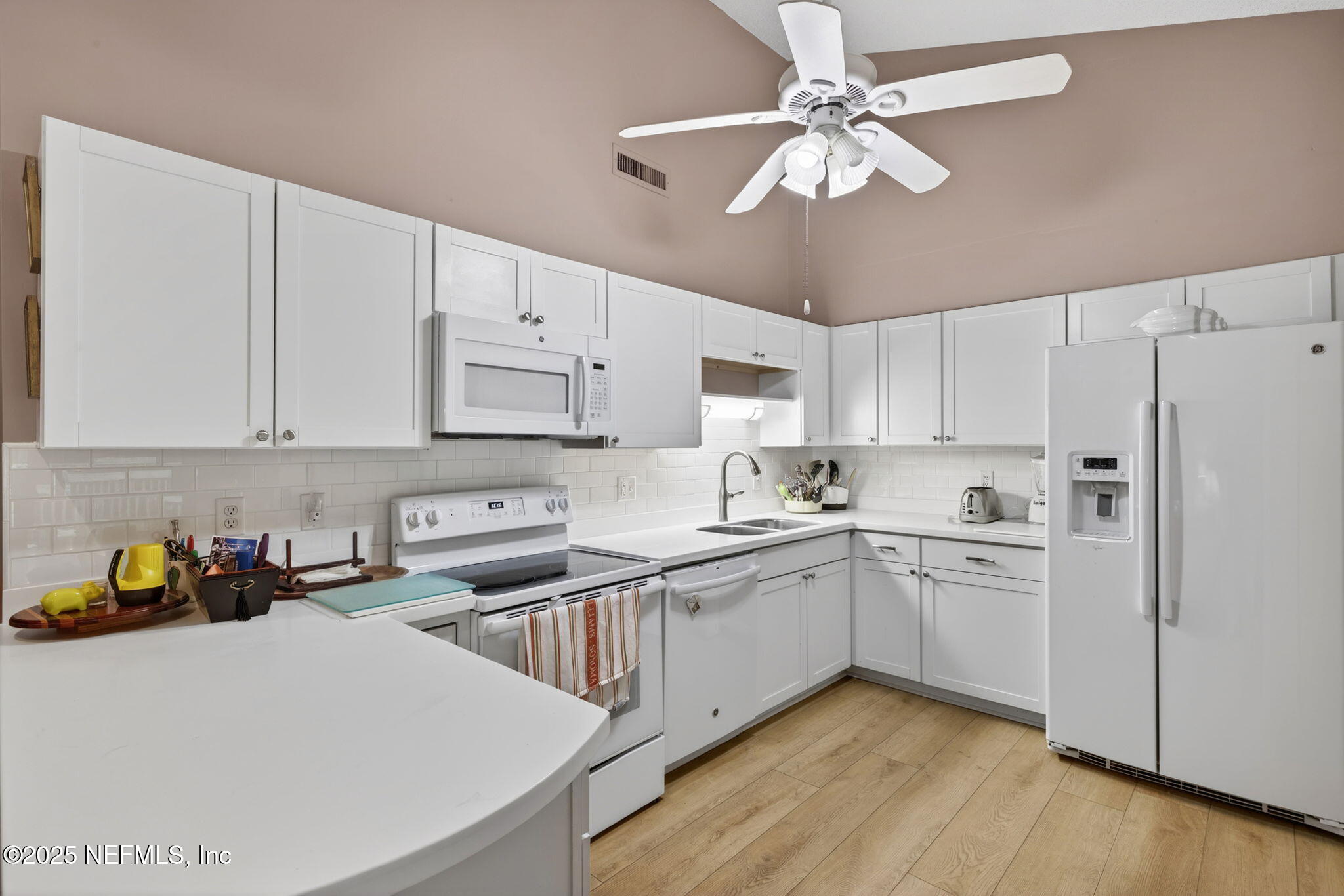4980 Morven Road Jacksonville, FL 32210 - Photo 11 of 35 a kitchen with cabinets stainless steel appliances and a counter space