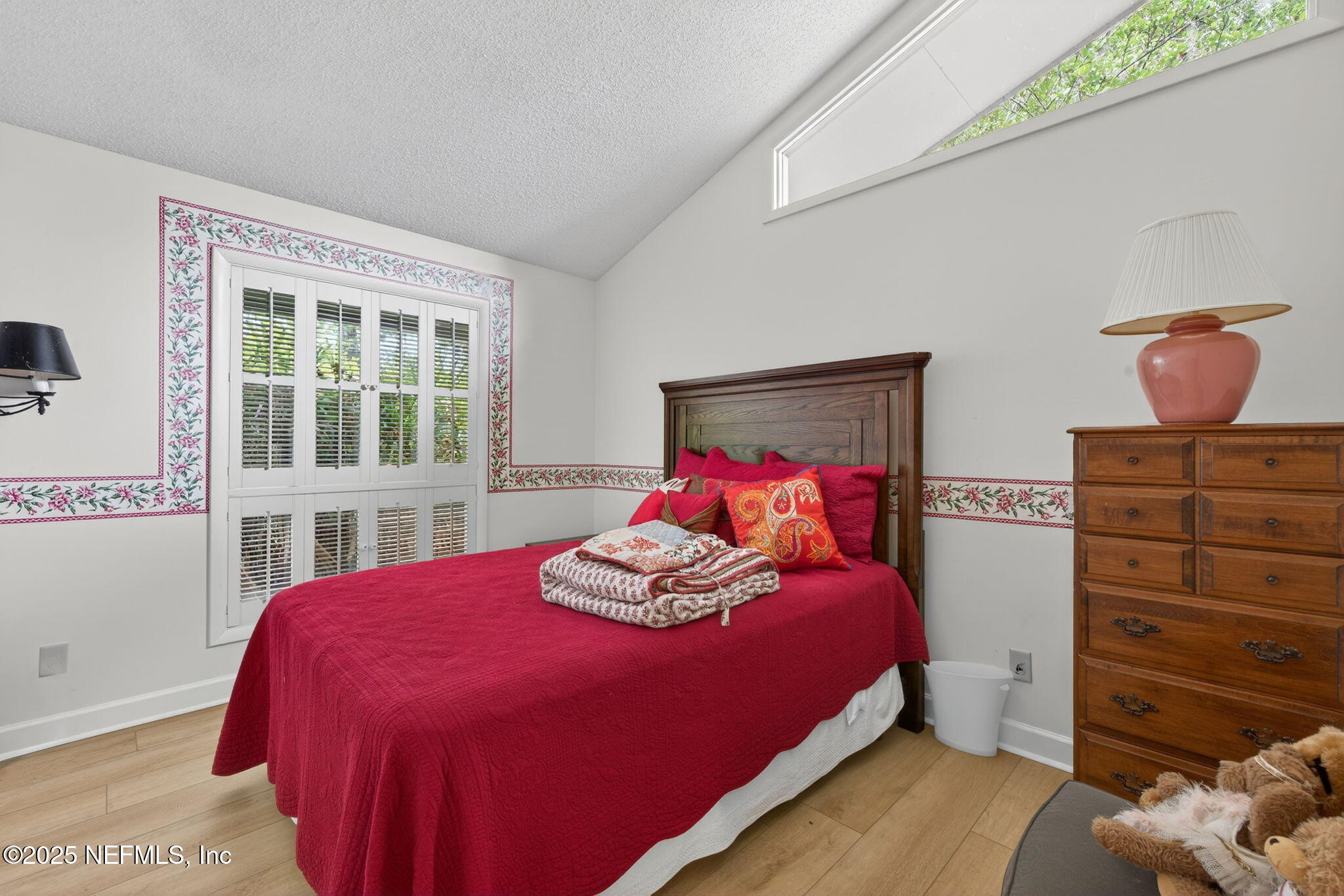 4980 Morven Road Jacksonville, FL 32210 - Photo 29 of 35 a bedroom with a bed and window