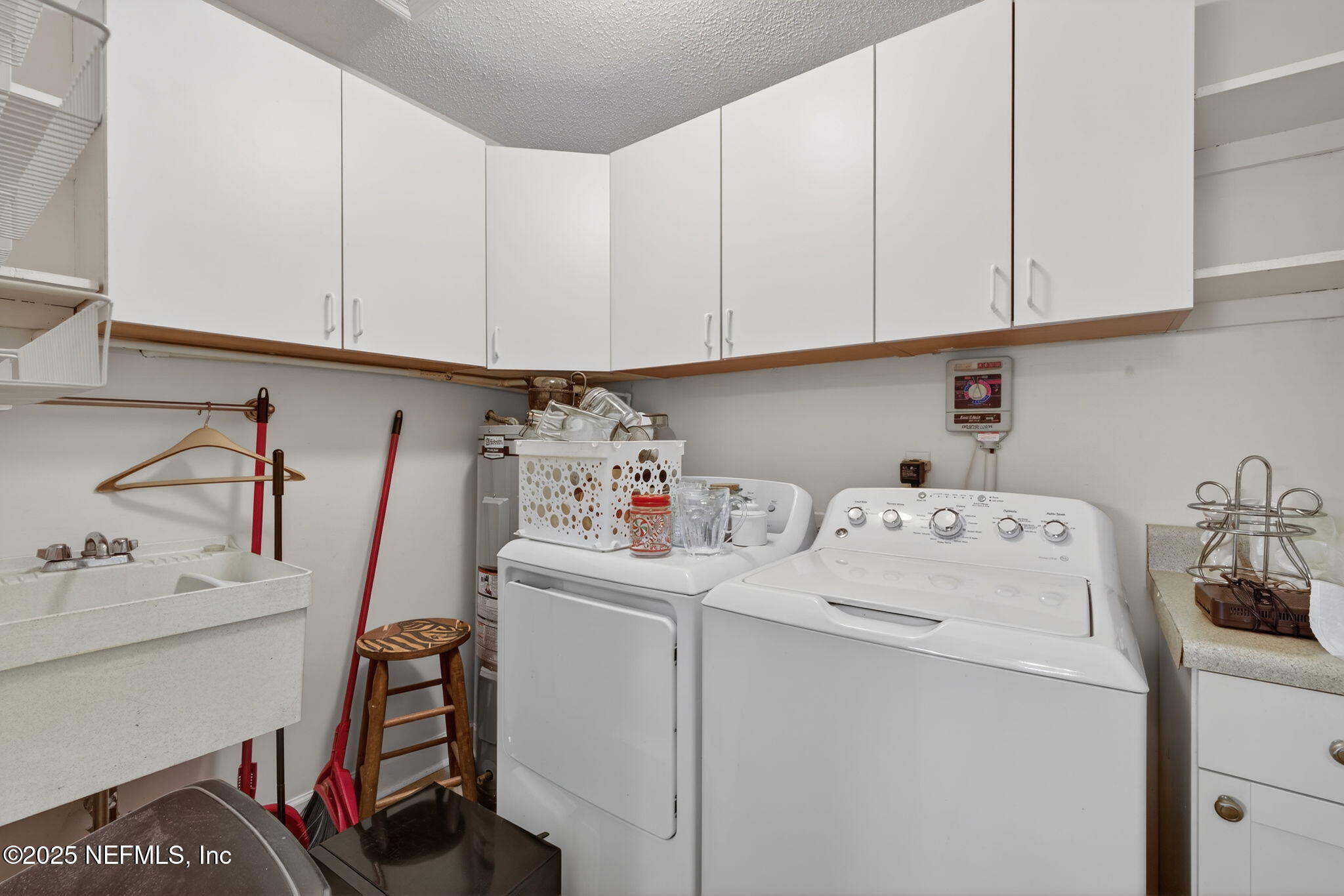 4980 Morven Road Jacksonville, FL 32210 - Photo 31 of 35 a utility room with dryer and washer