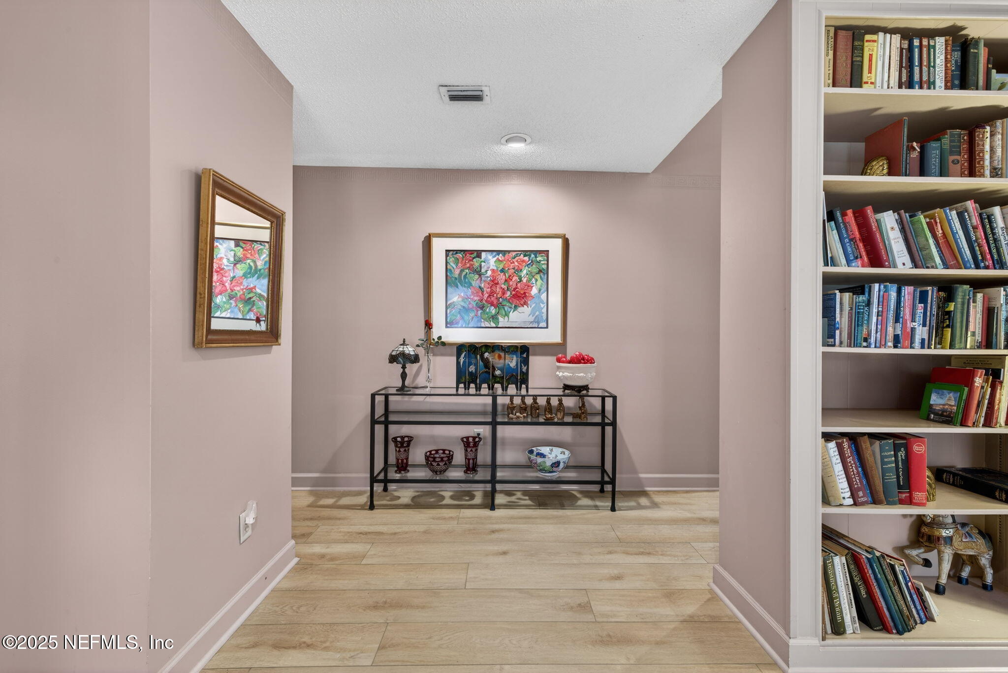 4980 Morven Road Jacksonville, FL 32210 - Photo 5 of 35 a view of a workspace with furniture and cabinet