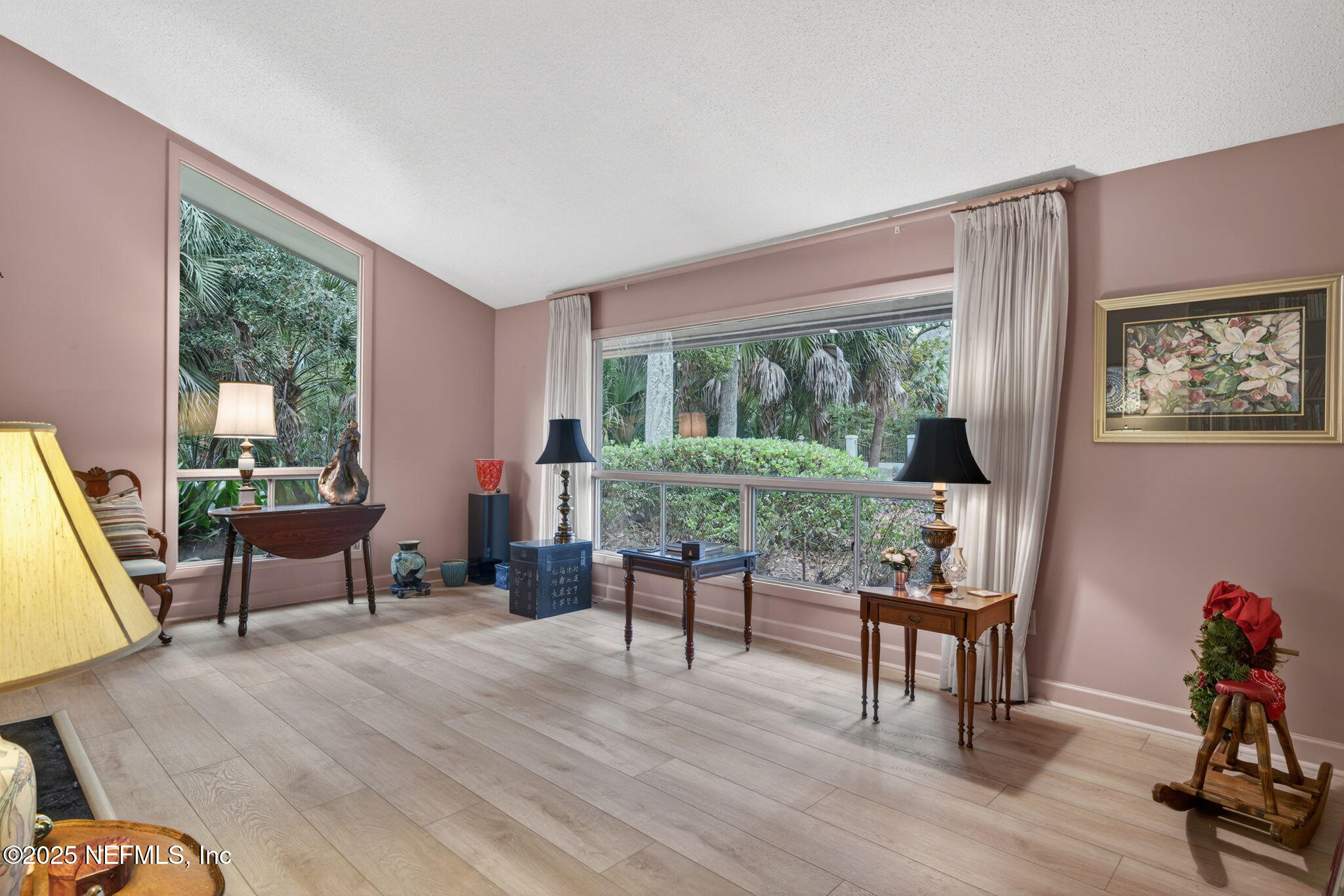4980 Morven Road Jacksonville, FL 32210 - Photo 6 of 35 a living room with furniture and a large window