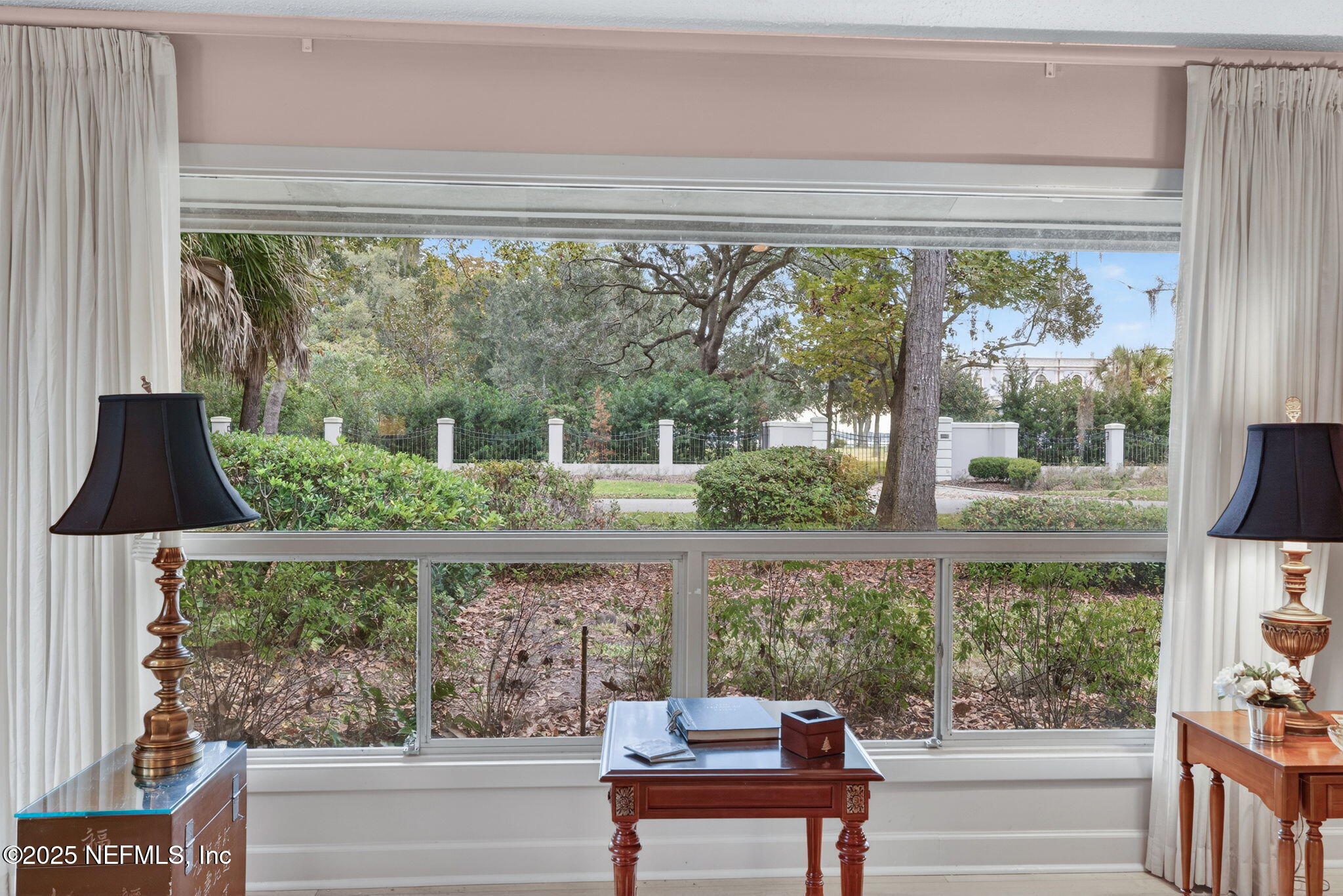 4980 Morven Road Jacksonville, FL 32210 - Photo 9 of 35 a view of a room that has a bed and wooden floor