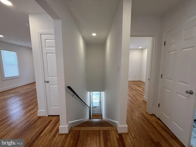 a view of entryway with wooden floor