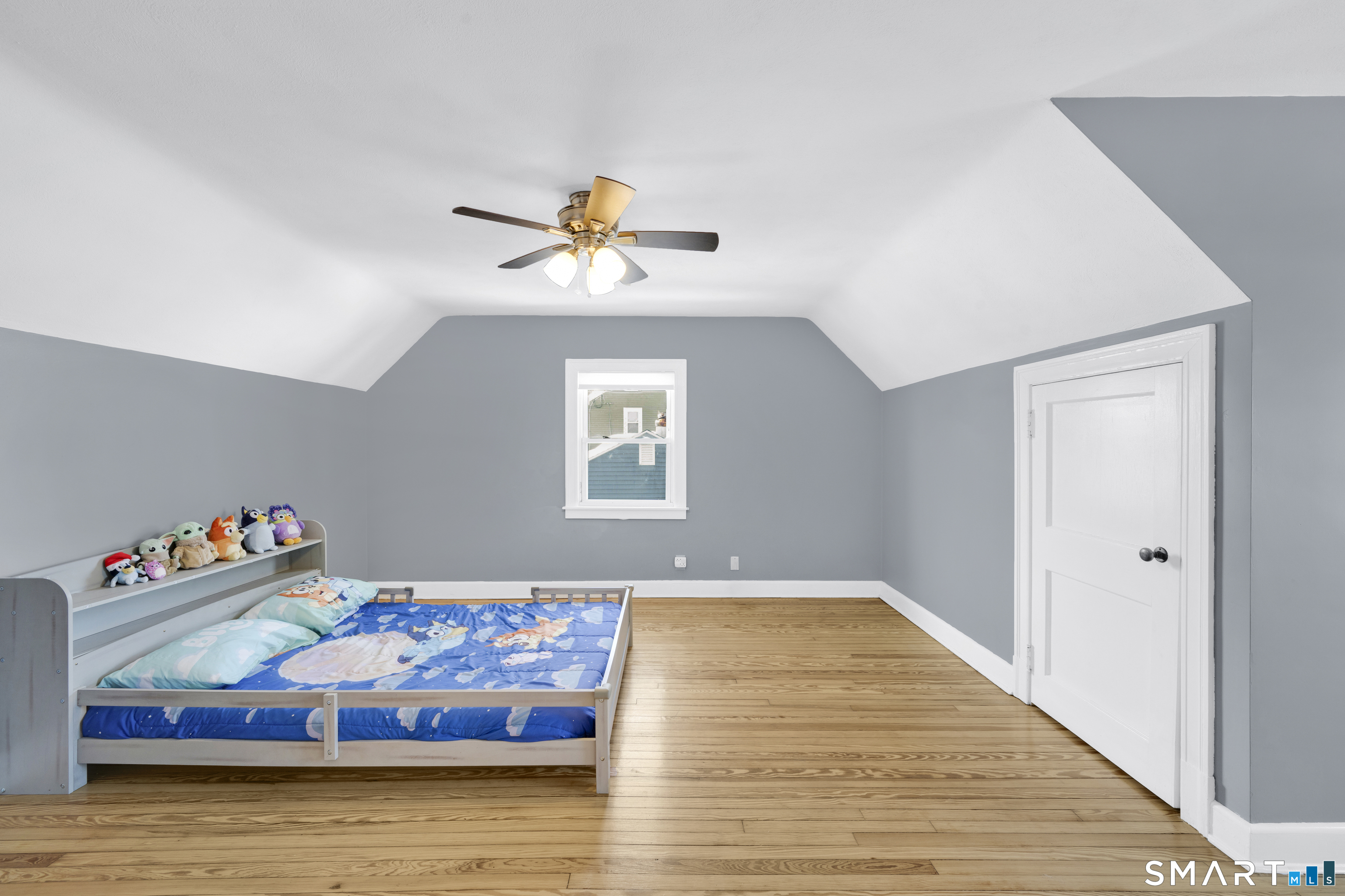 80 Cowles Street Hartford, CT 06114 - Photo 11 of 30 a bedroom with a bed and a chandelier