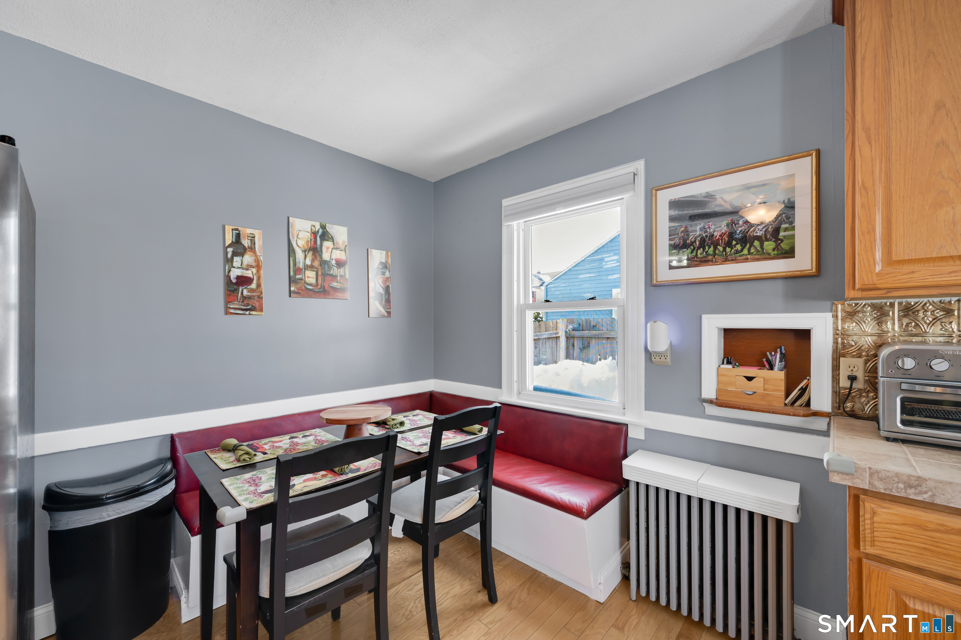 80 Cowles Street Hartford, CT 06114 - Photo 18 of 30 a living room with furniture a flat screen tv and a wall painting