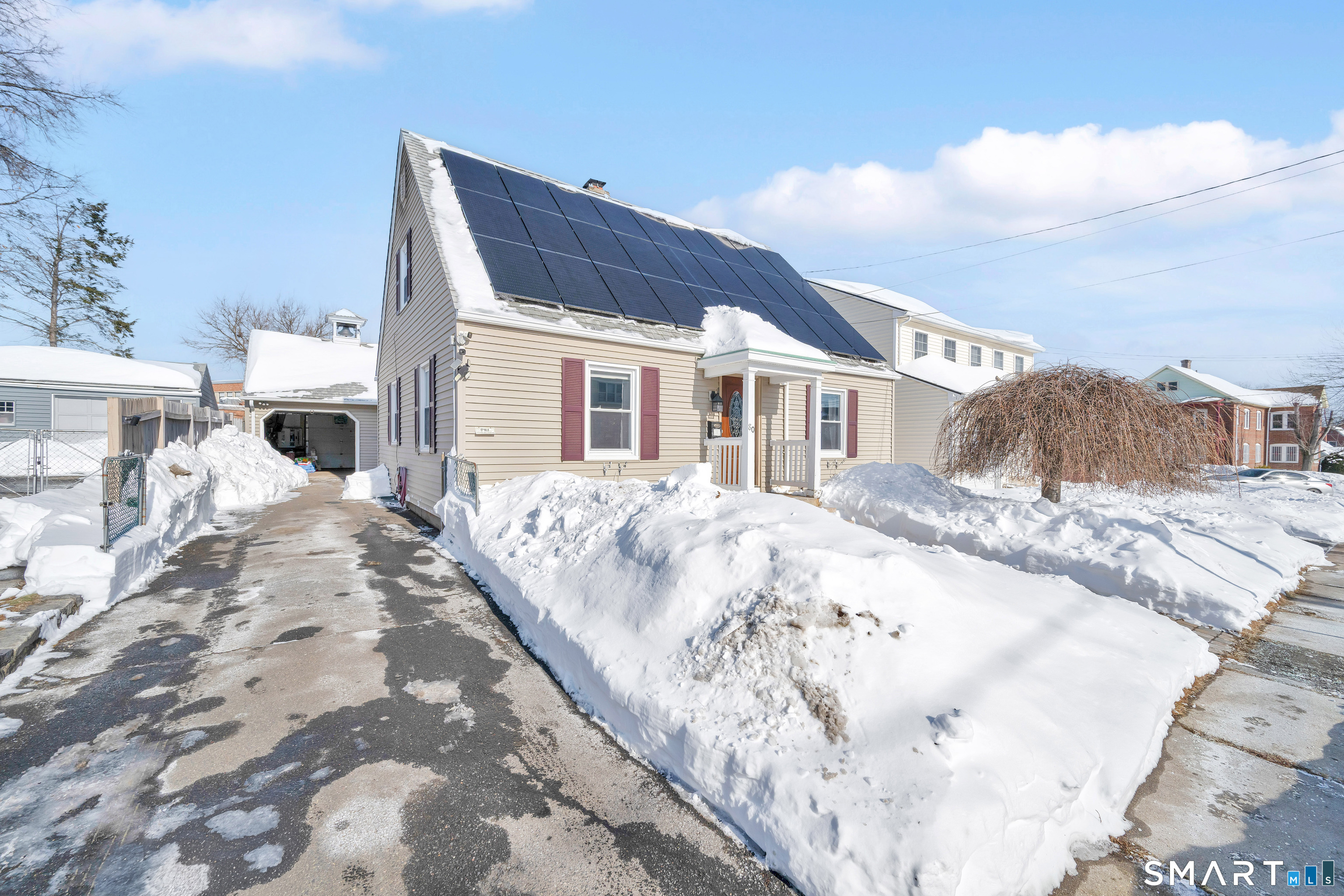 80 Cowles Street Hartford, CT 06114 - Photo 2 of 30 a front view of a house with a yard