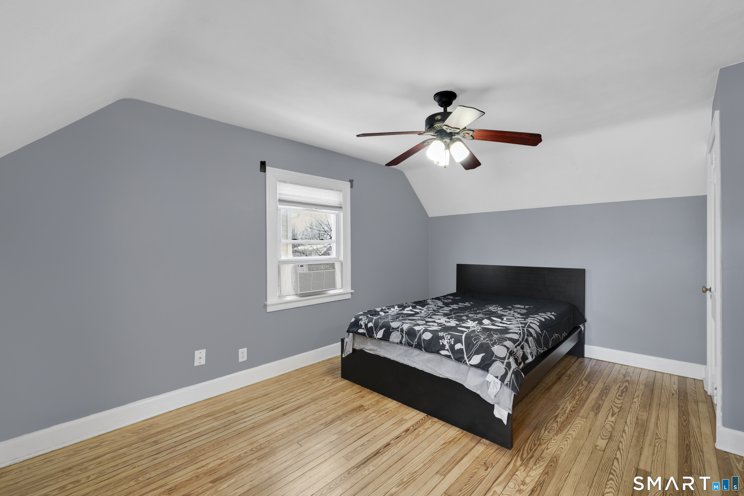 80 Cowles Street Hartford, CT 06114 - Photo 21 of 30 a bedroom with a bed and a ceiling fan