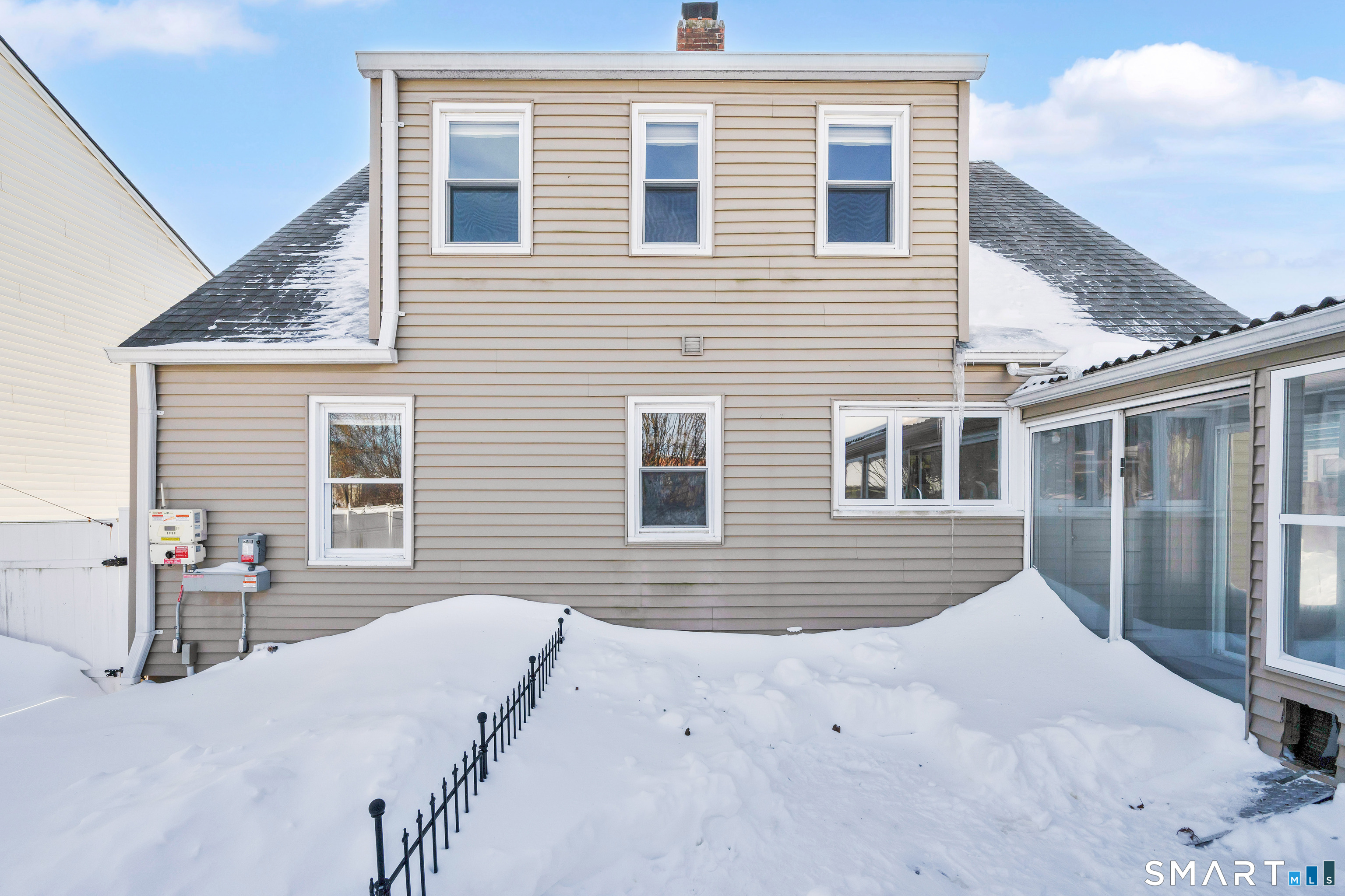 80 Cowles Street Hartford, CT 06114 - Photo 3 of 30 a front view of a house with many windows