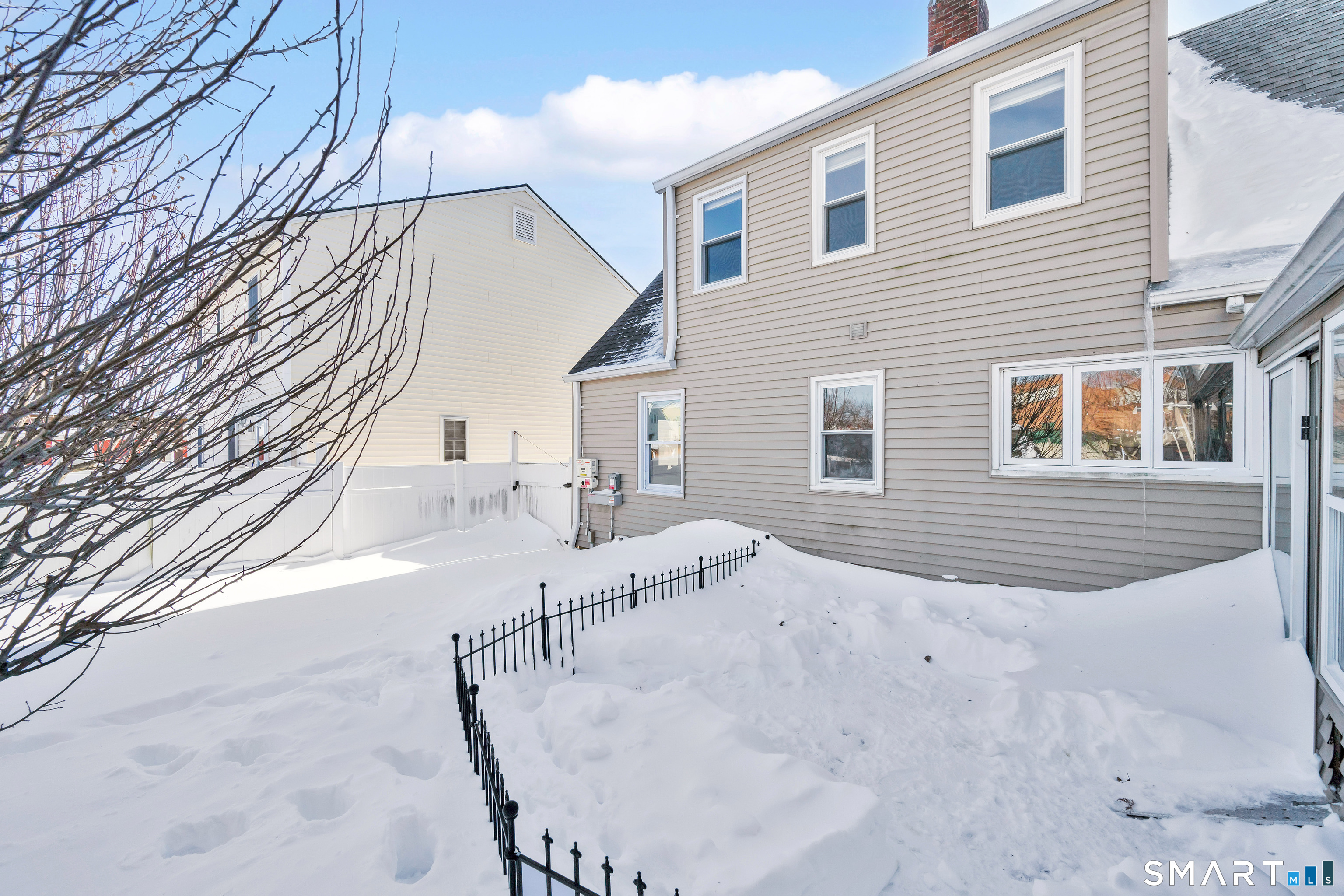80 Cowles Street Hartford, CT 06114 - Photo 4 of 30 a view of a house with a backyard
