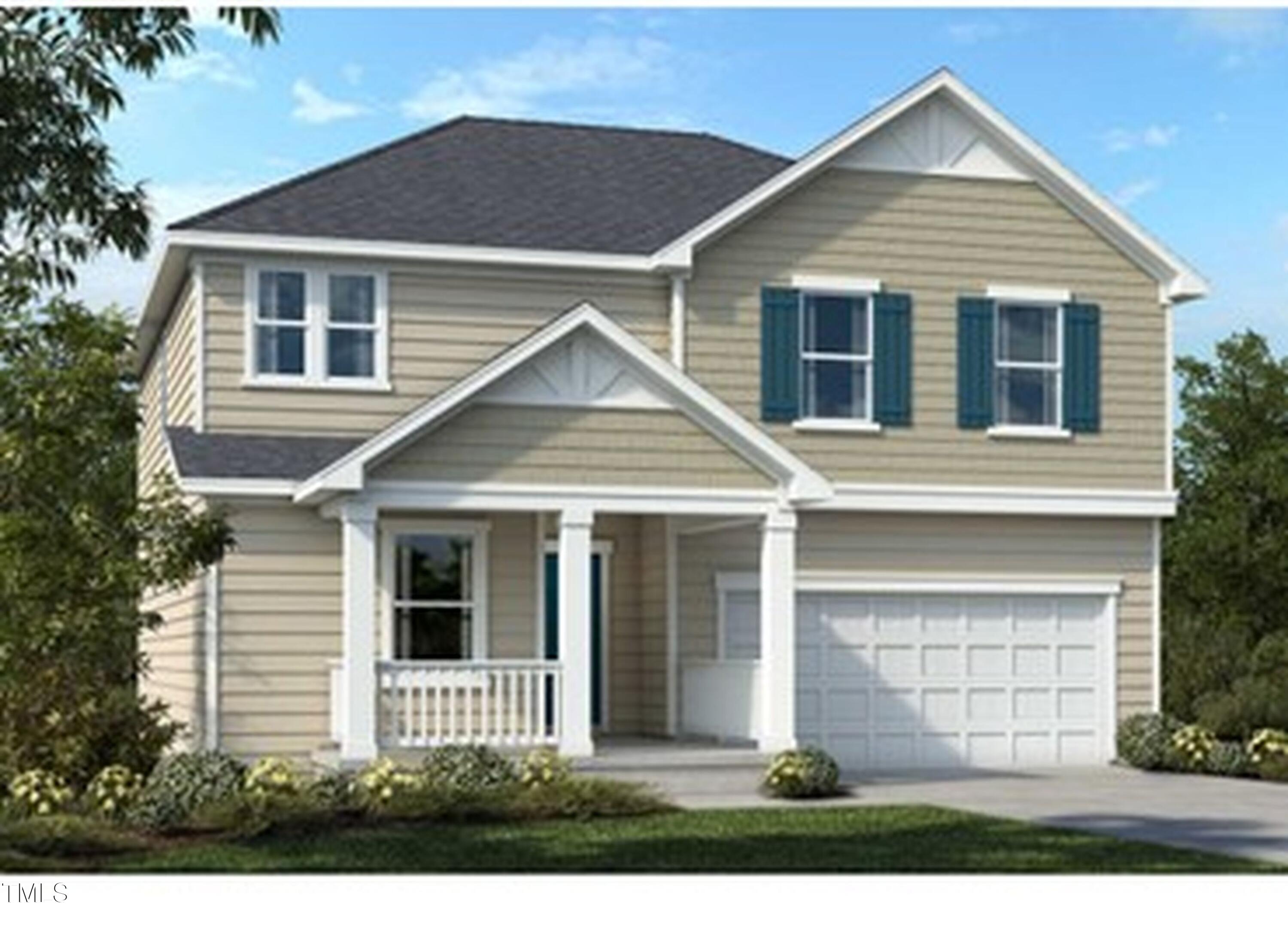 7633 Redwood Rdg Way Willow Spring, NC 27592 - Photo 1 of 10 a front view of a house with a yard