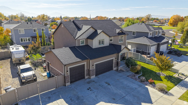 368 East 700 North Springville, UT 84663 - Photo 38 of 55 Aerial perspective of suburban area featuring a mountain backdrop