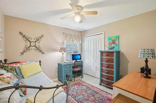a view of a workspace with furniture and a living room