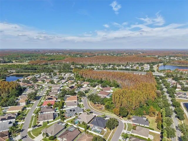 an aerial view of residential building and lake view