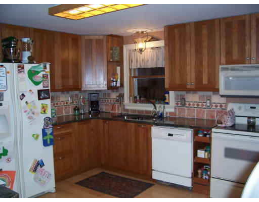 530 Barre Road Templeton, MA 01468 - Photo 2 of 5 a kitchen with refrigerator and sink