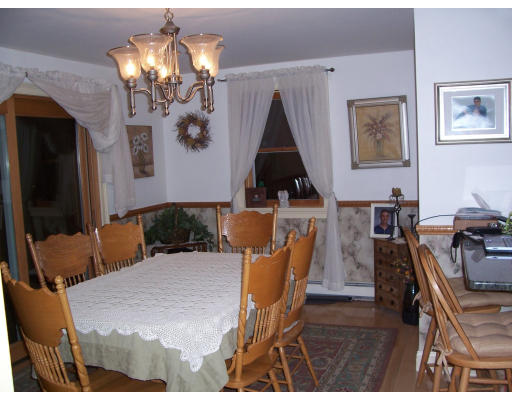 530 Barre Road Templeton, MA 01468 - Photo 3 of 5 a view of a dining room with furniture and chandelier