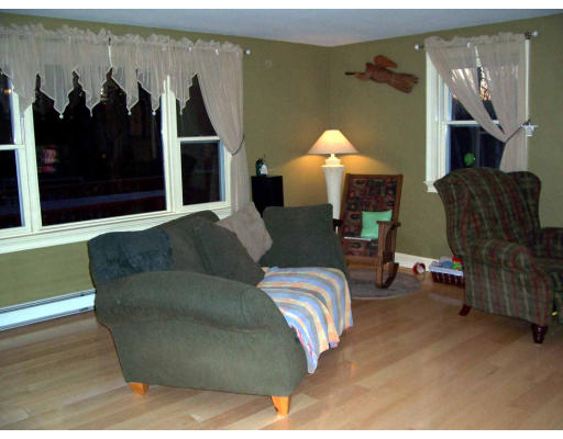 530 Barre Road Templeton, MA 01468 - Photo 4 of 5 a living room with furniture and a fireplace