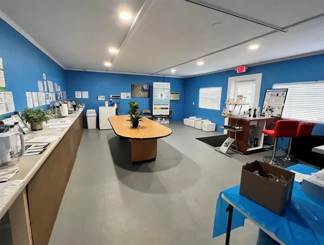 a room with furniture and a wooden floor