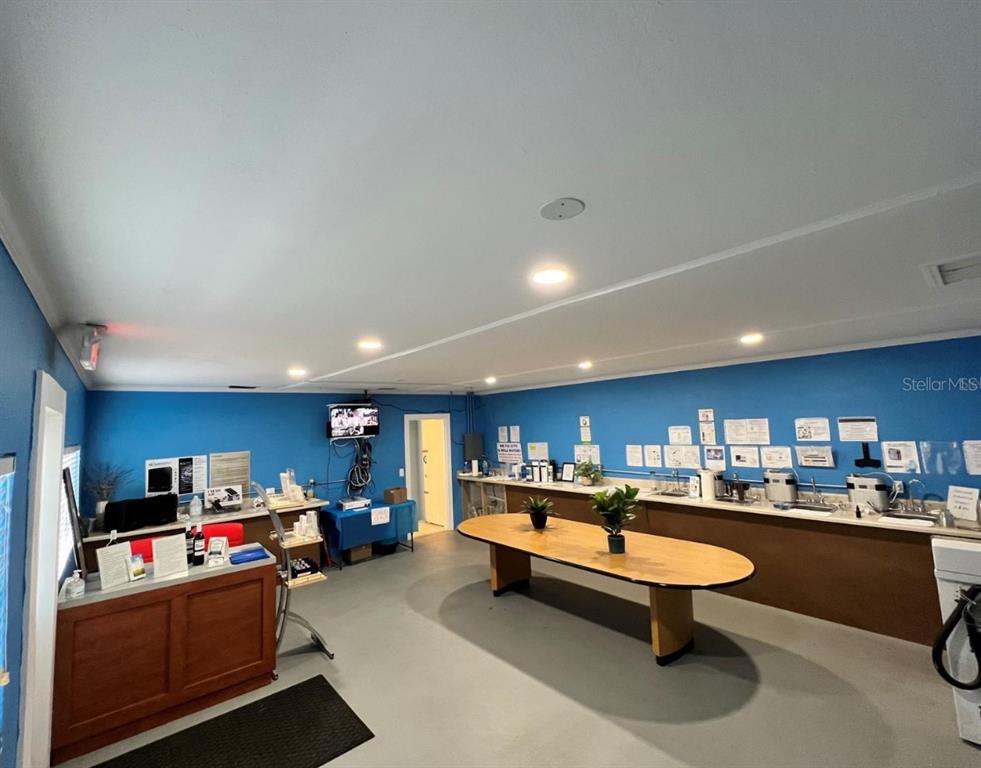 2315 West Old US Highway 441 Mount Dora, FL 32757 - Photo 16 of 19 a living room with furniture a pool table and a couch